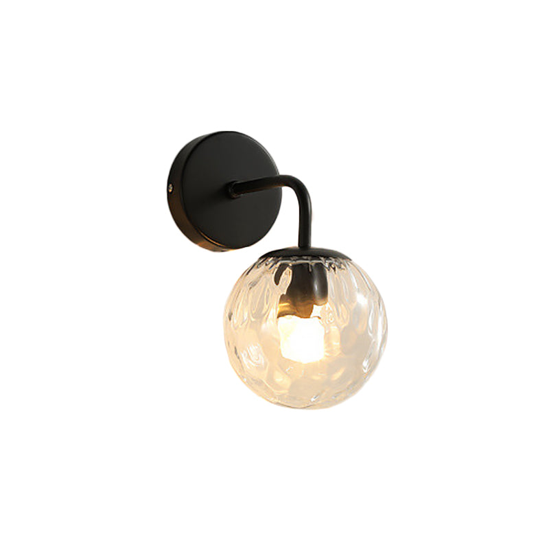 Taavita Spherical Wall Lamp Minimalist Clear Wing Glass 1-Light Bedroom Wall Mount with Curved Arm in Gold/Black