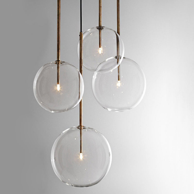 Clear Glass Globe Suspension Lighting Minimalist 6"/8"/10" Wide Single Gold Hanging Pendant over Table Clearhalo 'Ceiling Lights' 'Glass shade' 'Glass' 'Modern Pendants' 'Modern' 'Pendant Lights' 'Pendants' Lighting' 1937396