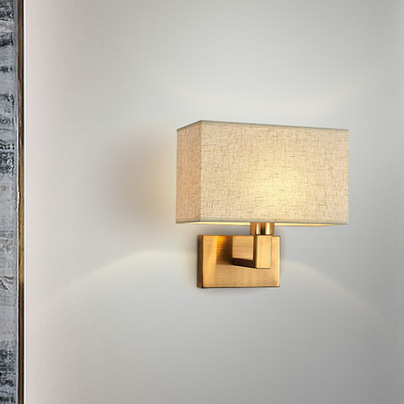 Postmodern Cuboid Sconce Lamp Fabric 1-Light Bedside Reading Wall Light in White/Beige/Brown with Black/Gold Arm Black Brown Clearhalo 'Cast Iron' 'Glass' 'Industrial' 'Modern wall lights' 'Modern' 'Tiffany' 'Traditional wall lights' 'Wall Lamps & Sconces' 'Wall Lights' Lighting' 1982898