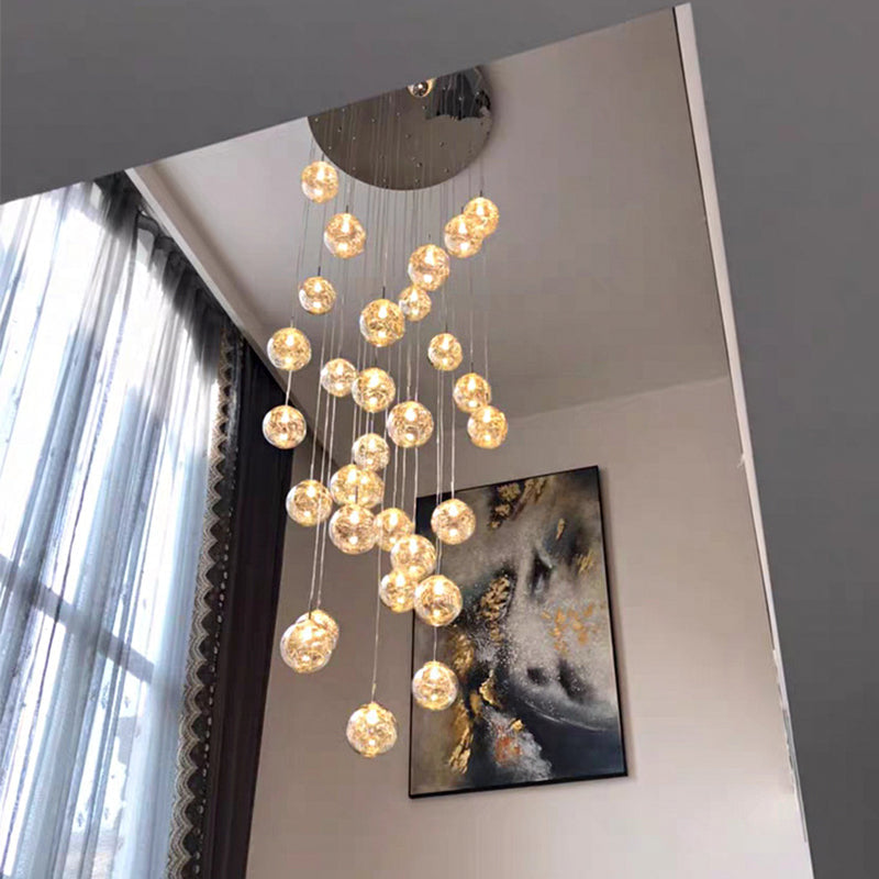 Clear Glass Spherical Multi Light Pendant Simplicity Chrome Hanging Lamp Kit for Stairs Clearhalo 'Ceiling Lights' 'Modern Pendants' 'Modern' 'Pendant Lights' 'Pendants' Lighting' 2025335