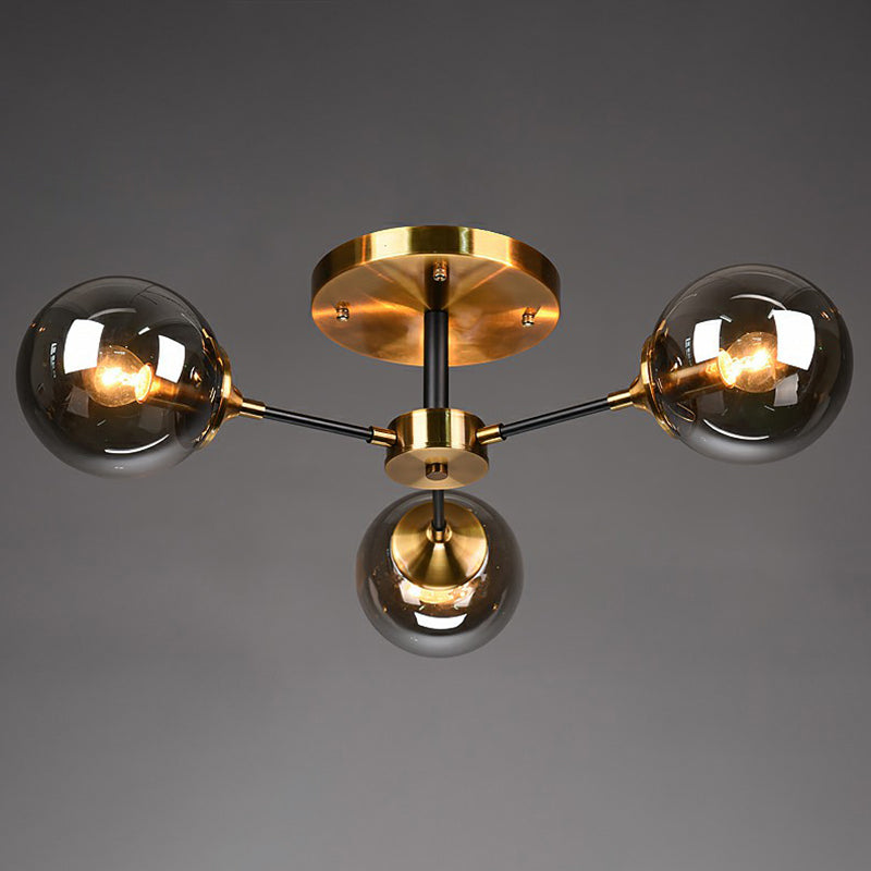 Black and Brass Radial Flush Mount Lighting Postmodern Metal Semi Flush Ceiling Light with Ball Glass Shade 6 Amber Clearhalo 'Ceiling Lights' 'Close To Ceiling Lights' 'Close to ceiling' 'Semi-flushmount' Lighting' 2354113