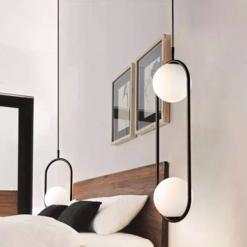 Globe Pendant Lighting Modern White Glass 1/2 Lights Black/Gold Hanging Ceiling Lamp for Bedroom Clearhalo 'Ceiling Lights' 'Glass shade' 'Glass' 'Iluminaci��n' 'L��mparas Colgantes' 'L��mparas de Techo' 'Modern Pendants' 'Modern' 'Pendant Lights' 'Pendants' Hogar' Lighting' 188093