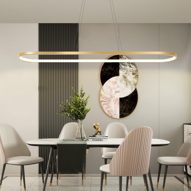 Minimalist Metal Elongated Gold-Plated Pendant Light Taavita Over Table