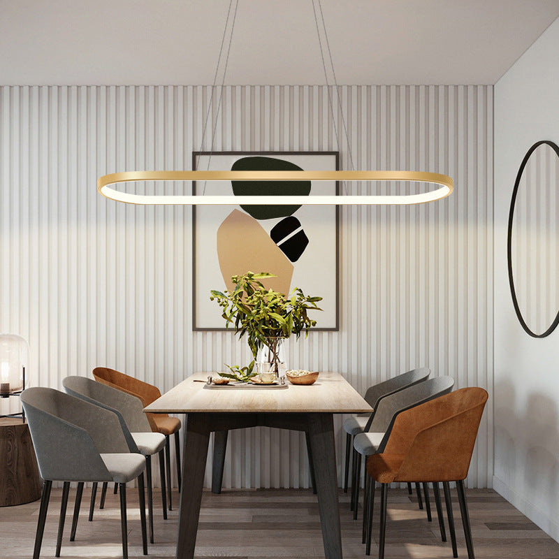 Minimalist Metal Elongated Gold-Plated Pendant Light Taavita Over Table