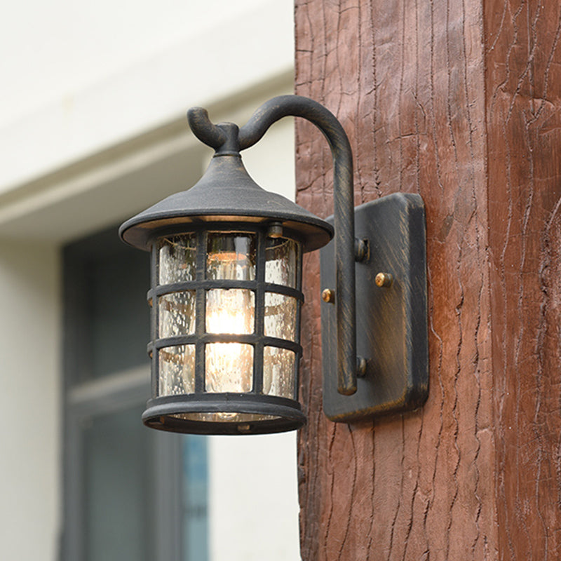 Taavita Glass Lantern Wall Lamp - a lightweight outdoor wall light in Bronze/Black, rustic style, 220V-240V / 110V-120V, for E26/E27 bulb, suitable for outdoor use