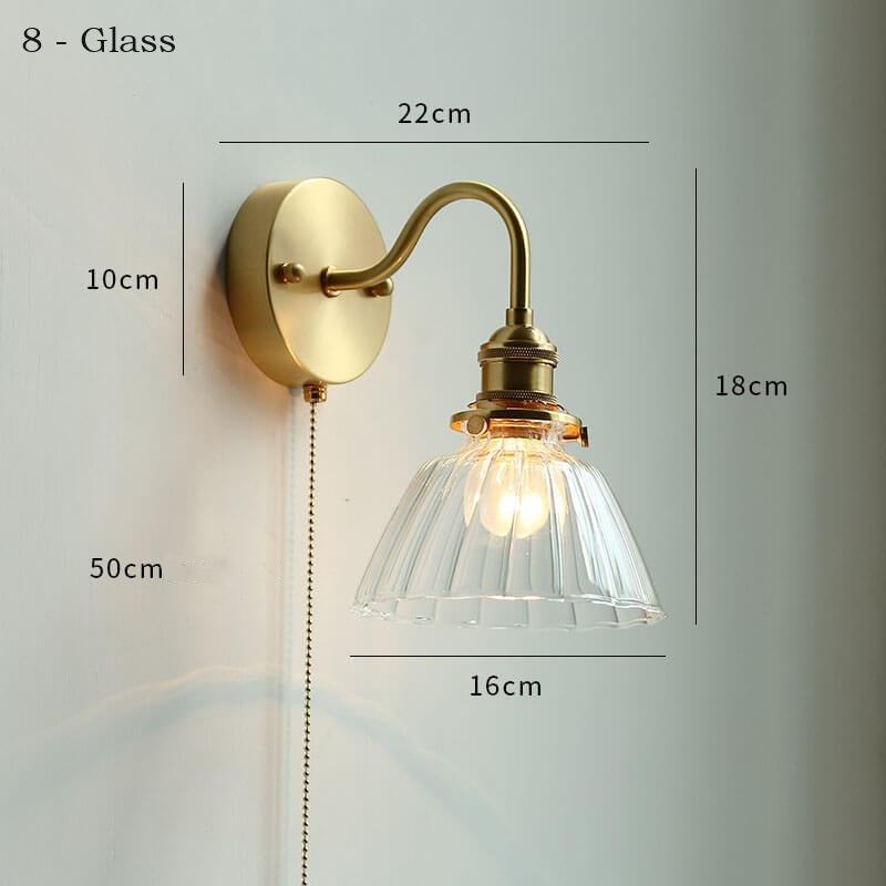 White adjustable wall lamp with pull chain switch, featuring a copper holder for durability and style.