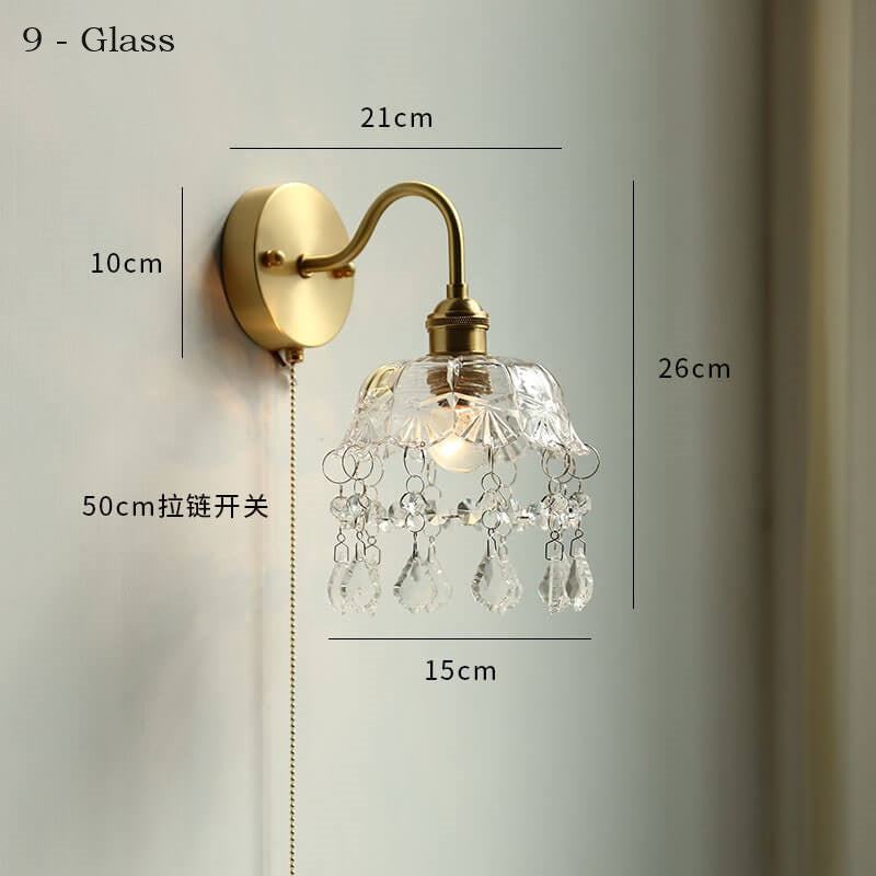 Glass adjustable wall lamp with pull chain switch, featuring a copper holder for durability and style.