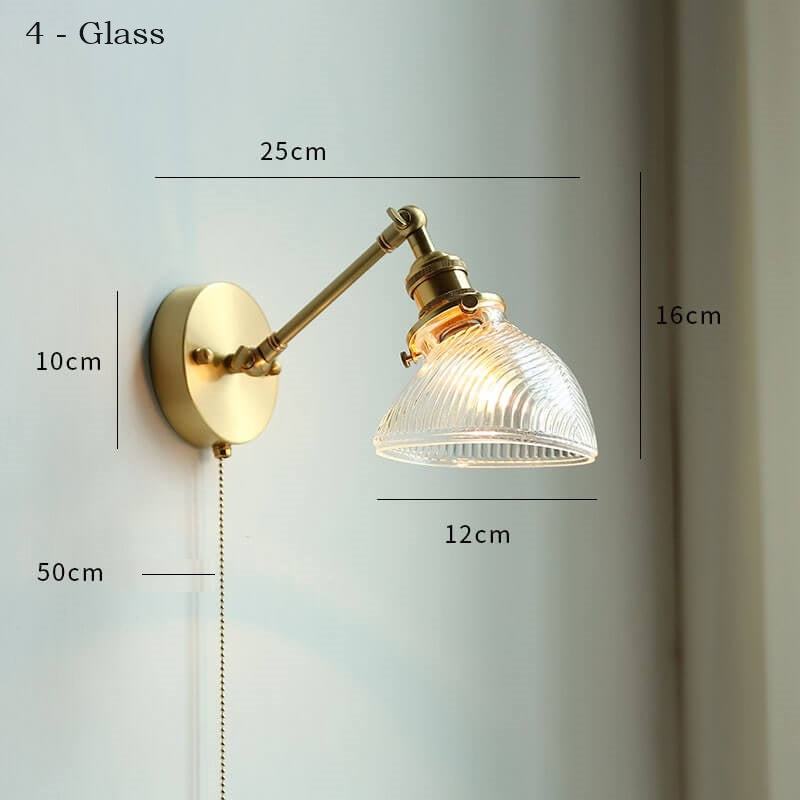 Ceramic adjustable wall lamp with pull chain switch, mounted on a copper fixture.