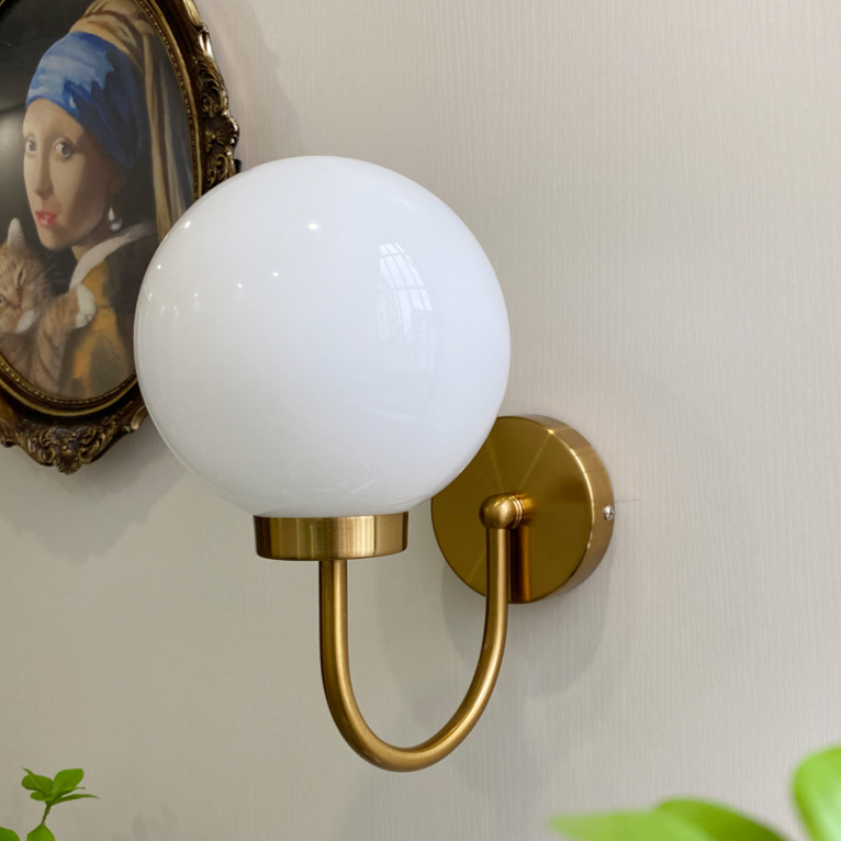 Taavita Orb Wall Lamp: A Symphony of Light and Elegance