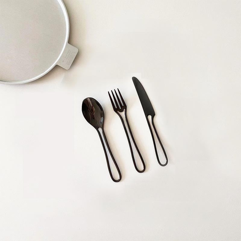 Elegant Svelte Void Cutlery Collection featuring minimalist design with hollow handles