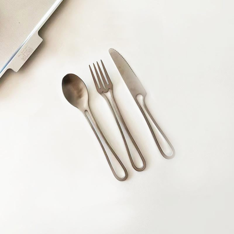 Elegant Svelte Void Cutlery Collection featuring minimalist design with hollow handles