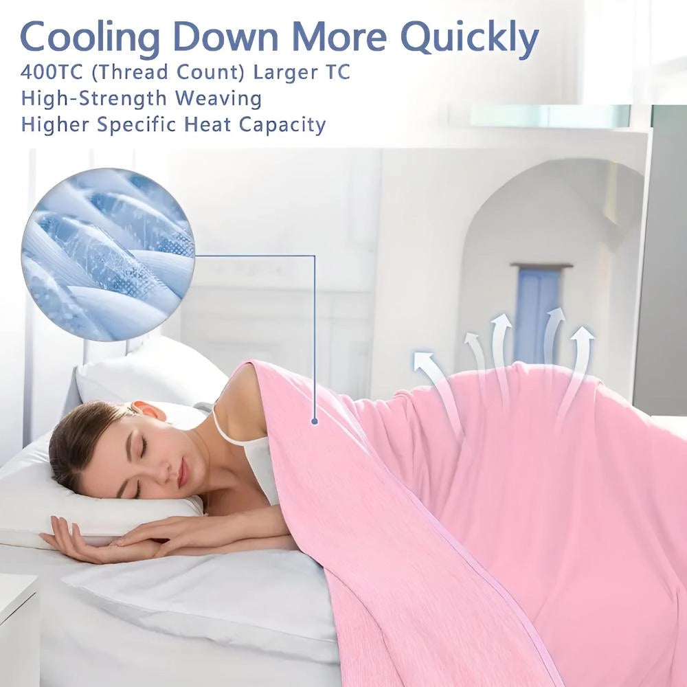 Cooling blanket on a bed, designed for quick cool down and temperature regulation, featuring a soft, comfortable texture, perfect for leisure and relaxation.