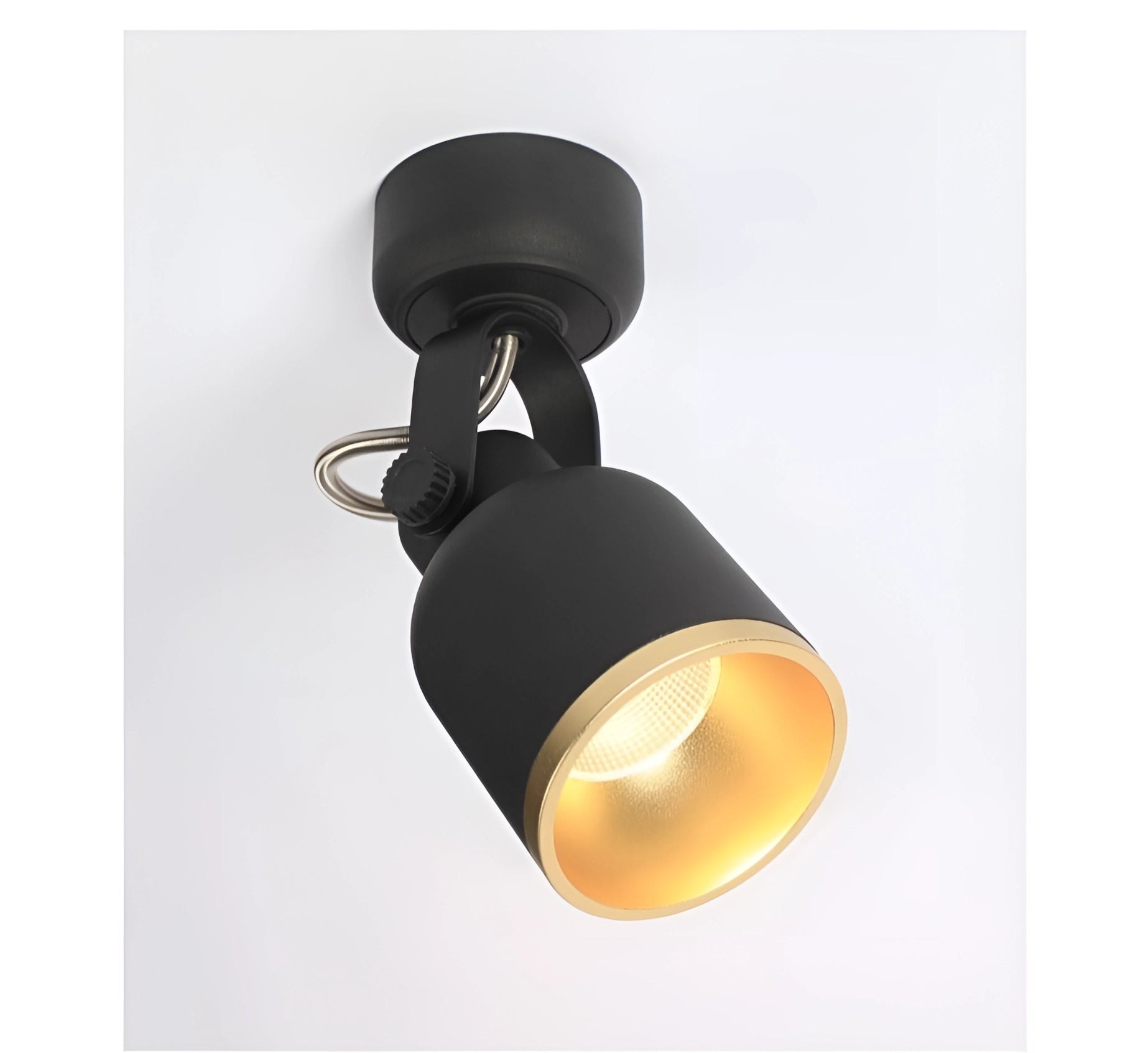 Adjustable black and gold LED track light featuring a modern design, mounted on the ceiling with a circular and rectangular structure that adds a sophisticated touch to any space.