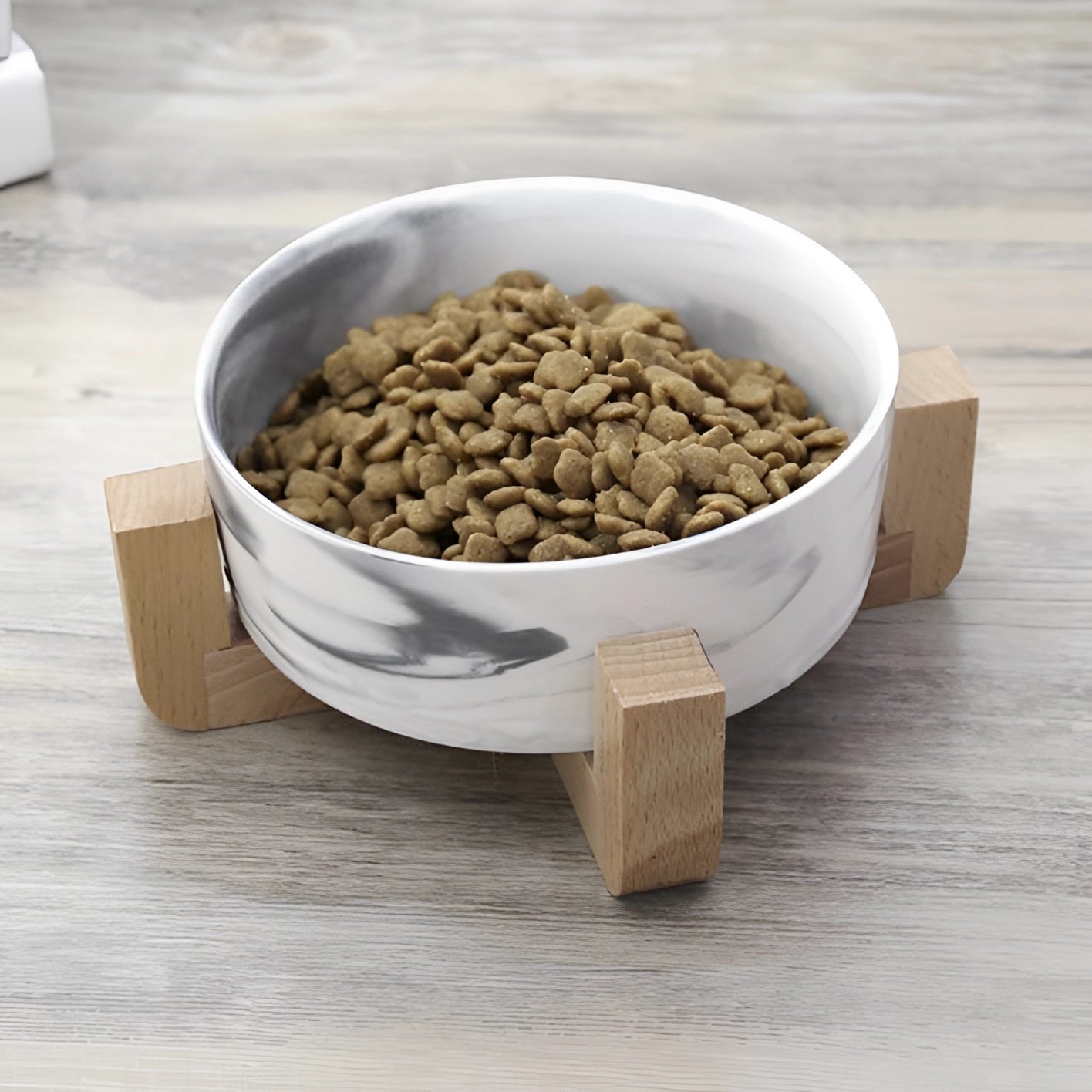 Adjustable multi-level bamboo pet feeder with colorful dishes, showcasing a stylish and functional design for feeding pets, featuring multiple heights and vibrant dish options.