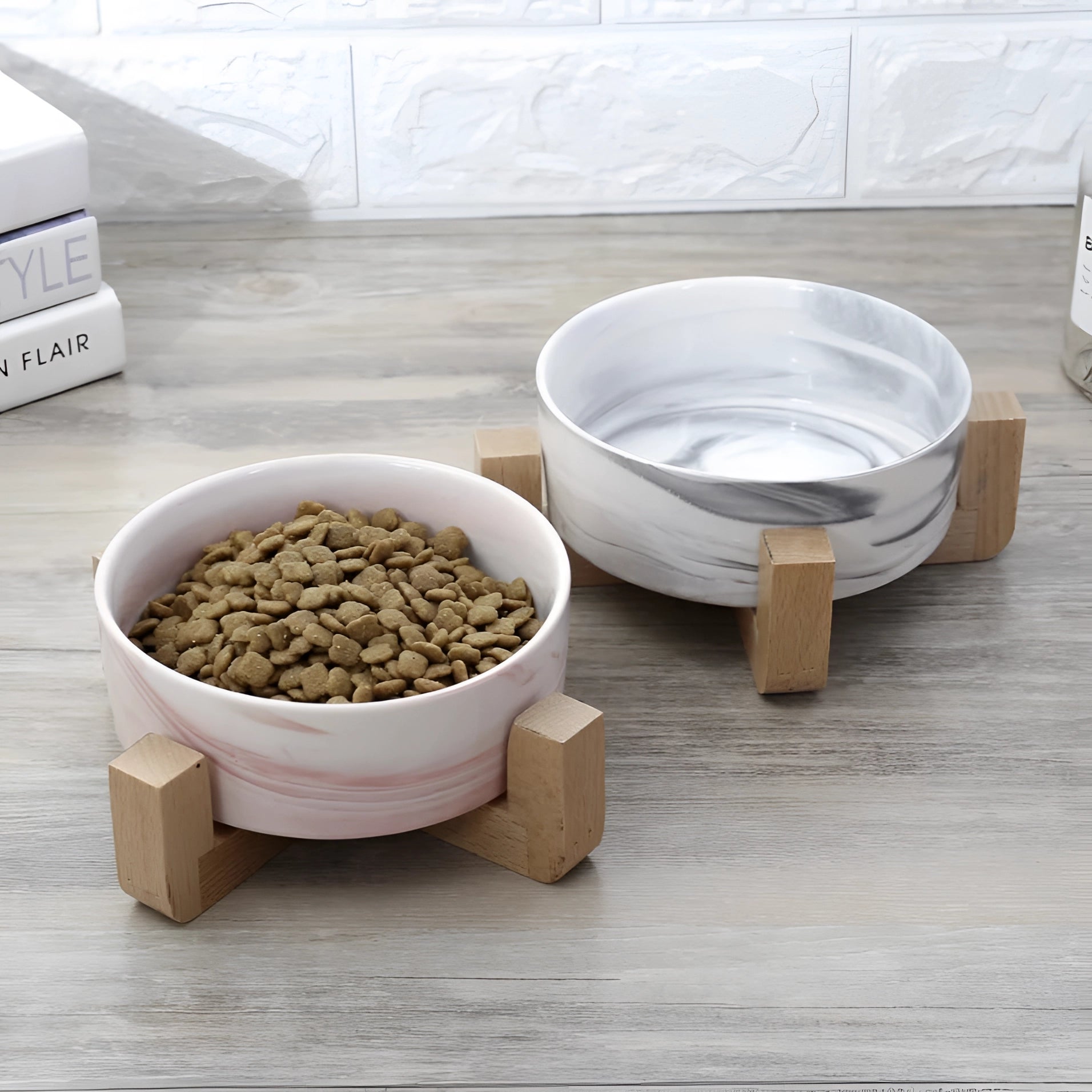 Adjustable multi-level bamboo pet feeder with colorful dishes, featuring a natural wood structure designed to elevate food bowls for pets.