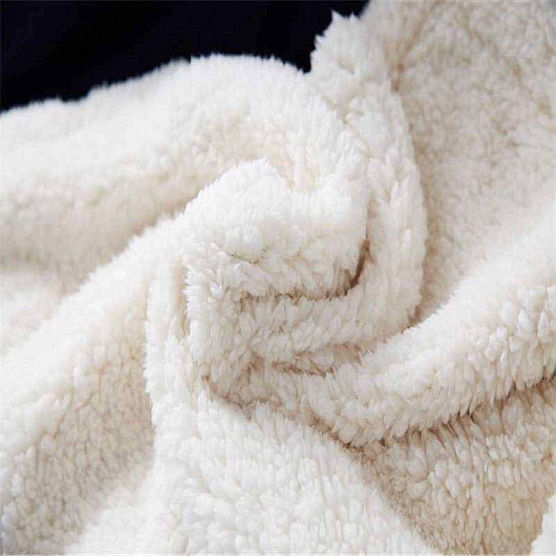 A cozy fleece blanket featuring a close-up of a patriotic American flag design with stars and stripes, showcasing a soft woolen texture in beige and carmine hues.