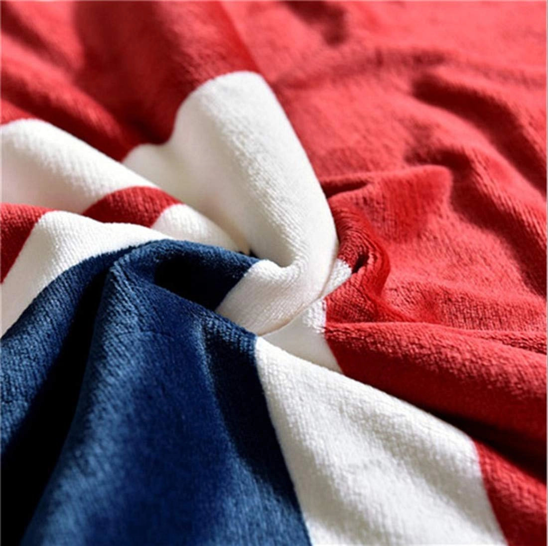 American flag fleece blanket with a cozy design featuring patriotic stars and stripes pattern in red, white, and blue colors. Close-up view highlighting the soft textile material.