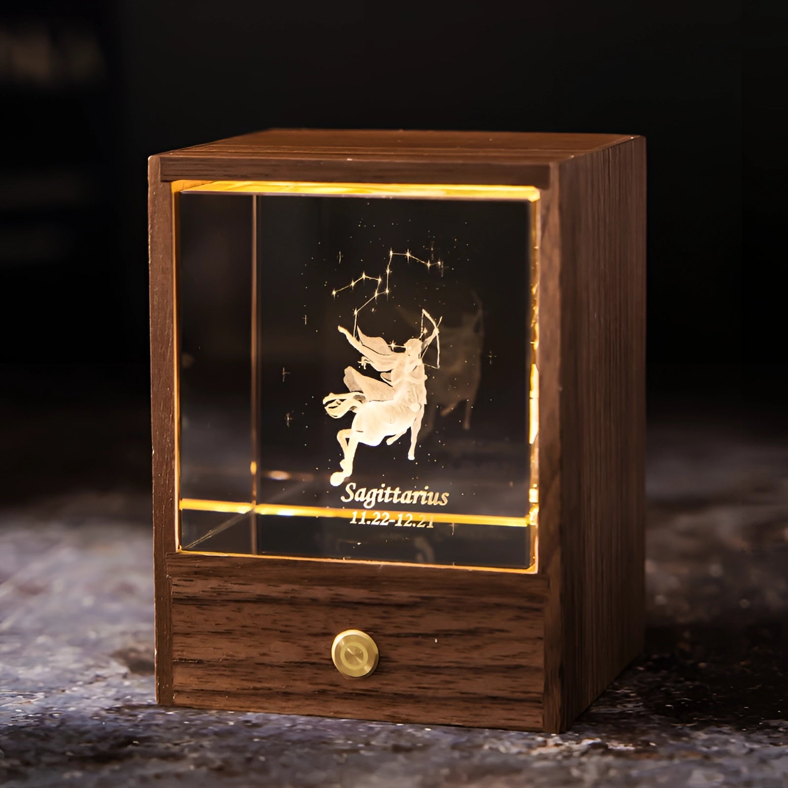 Aquarius Zodiac LED Night Light featuring the Protector design, with an artistic depiction of an elk or reindeer silhouette on a rectangular wooden base, creating a warm and personalized astrology-themed ambiance.