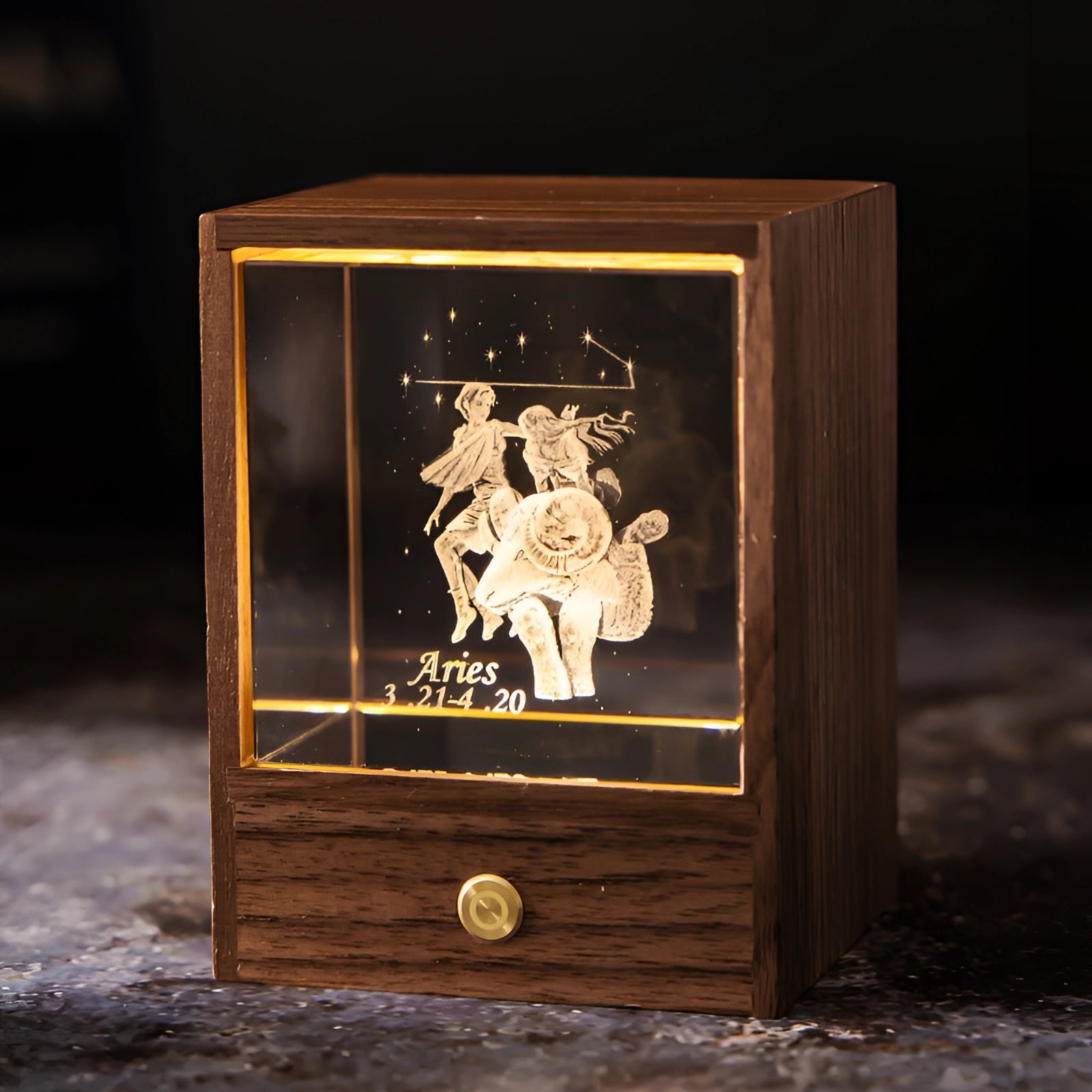 
A personalized Aquarius Zodiac LED night light featuring an Aries design, with a rectangular wooden base. The artwork is illuminated in the dark, showcasing intricate astrology-related art and font details.