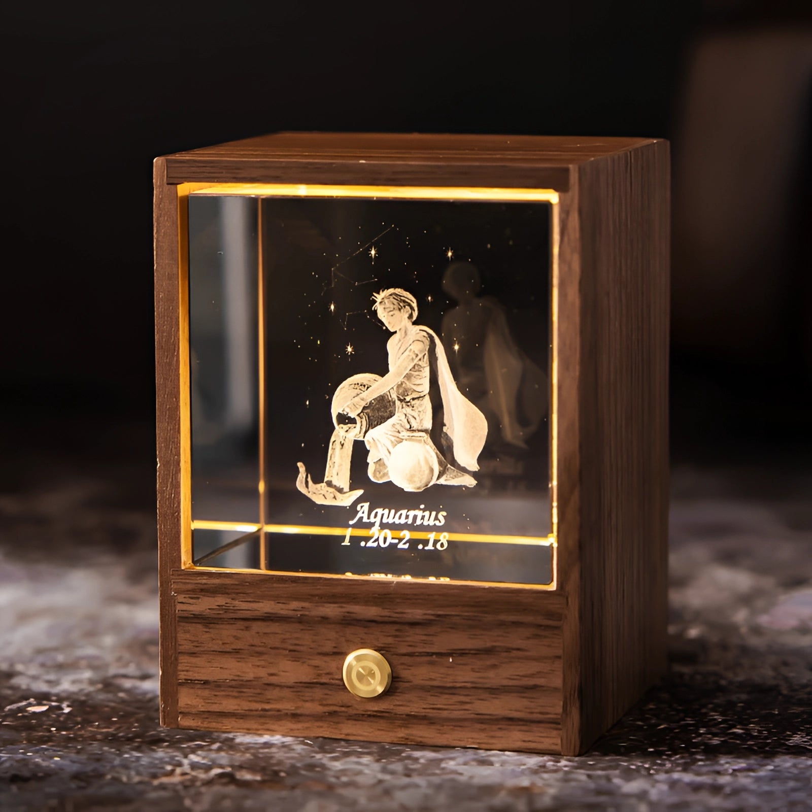 Aquarius Zodiac LED Night Light featuring a rectangular wooden base with a personalized astrology design, illuminated against a warm brown background.