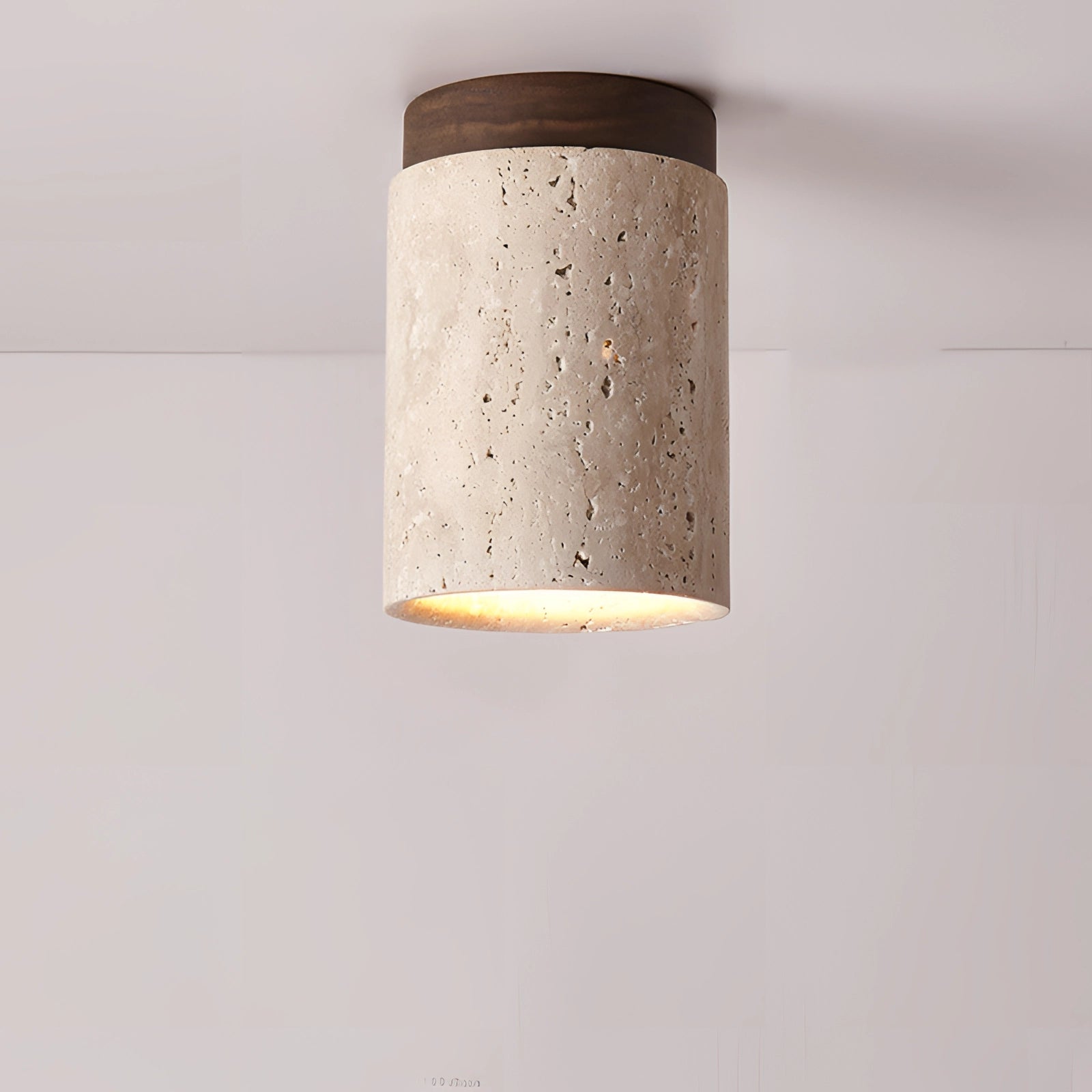 Artisan stone finish flush mount ceiling light with a D walnut base, featuring an eco-friendly design and an E26 socket. The fixture has a cylindrical shape with a sophisticated blend of tints and shades, combining composite materials and metal elements in a rectangular ceiling fixture format.