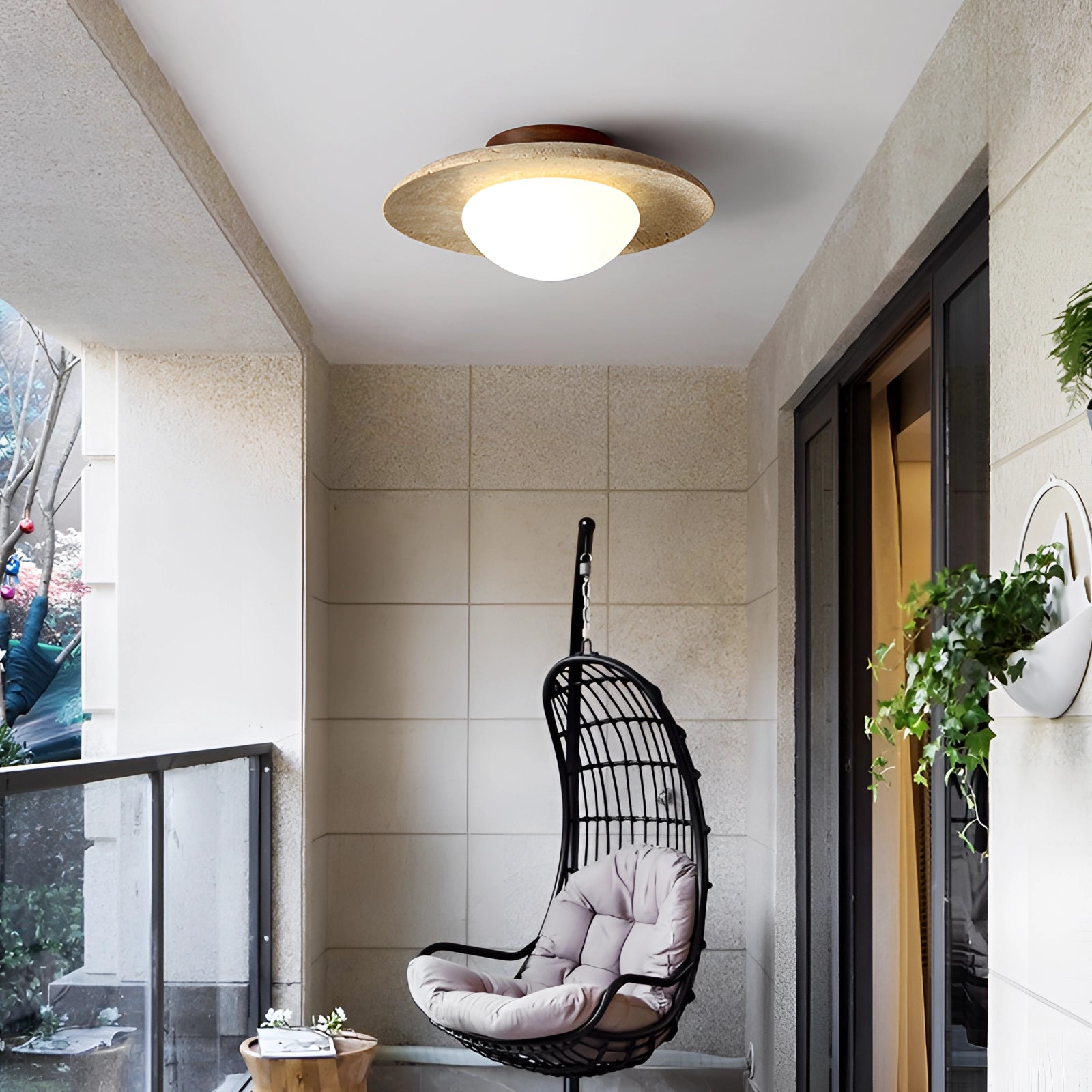 Artisan stone finish eco-friendly flush mount ceiling light with a B(E26) socket, featured in an interior setting showcasing wooden elements and modern decor.