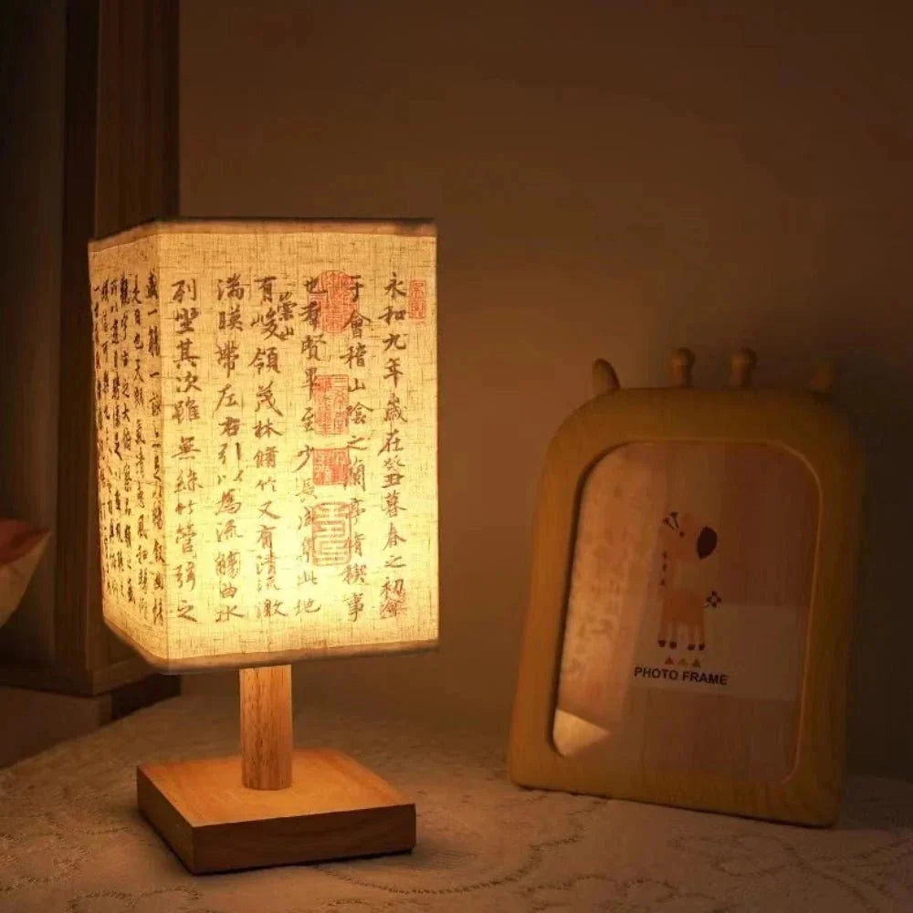 Asian calligraphy lamp with a wooden base, featuring a compact nightlight design measuring 27cm, showcasing artistic handwriting and intricate font elements.