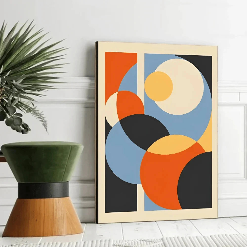 
A mid-century modern canvas art print featuring geometric designs, including rectangles and abstract elements, with a plant motif, displayed in a size of 30 x 42 cm.