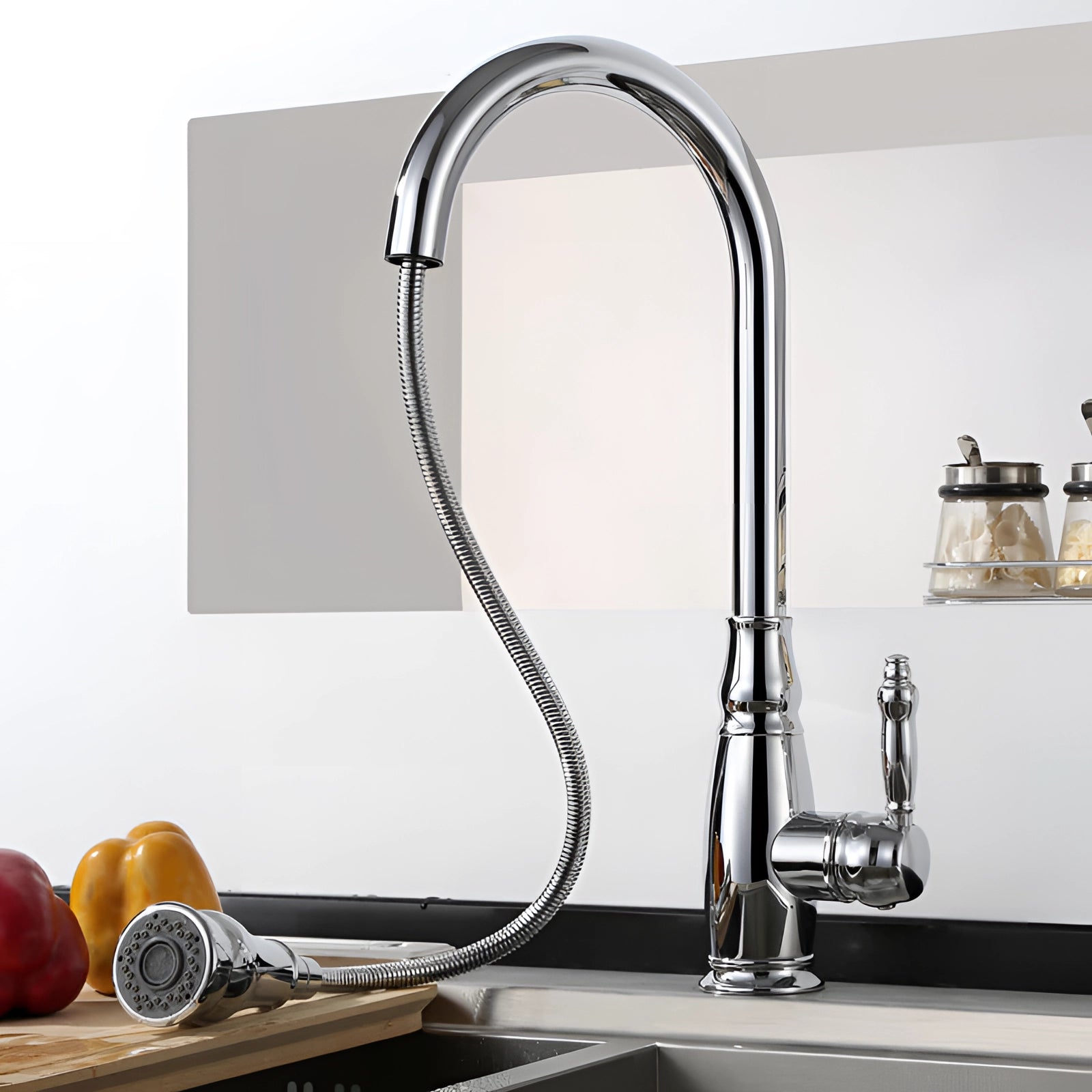 Black kitchen faucet with a pull-down sprayer and single handle, featuring an eco-friendly design, set against a wooden backdrop.