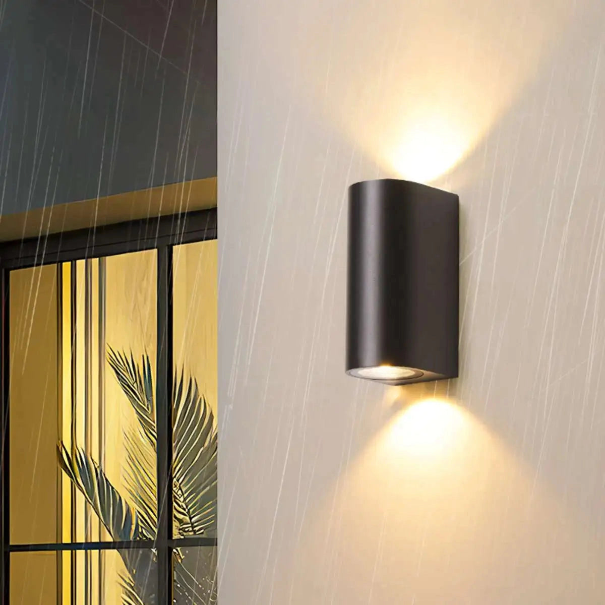 Black LED cylindrical outdoor wall lamp mounted on a building exterior, showcasing its modern design and weather-resistant features.