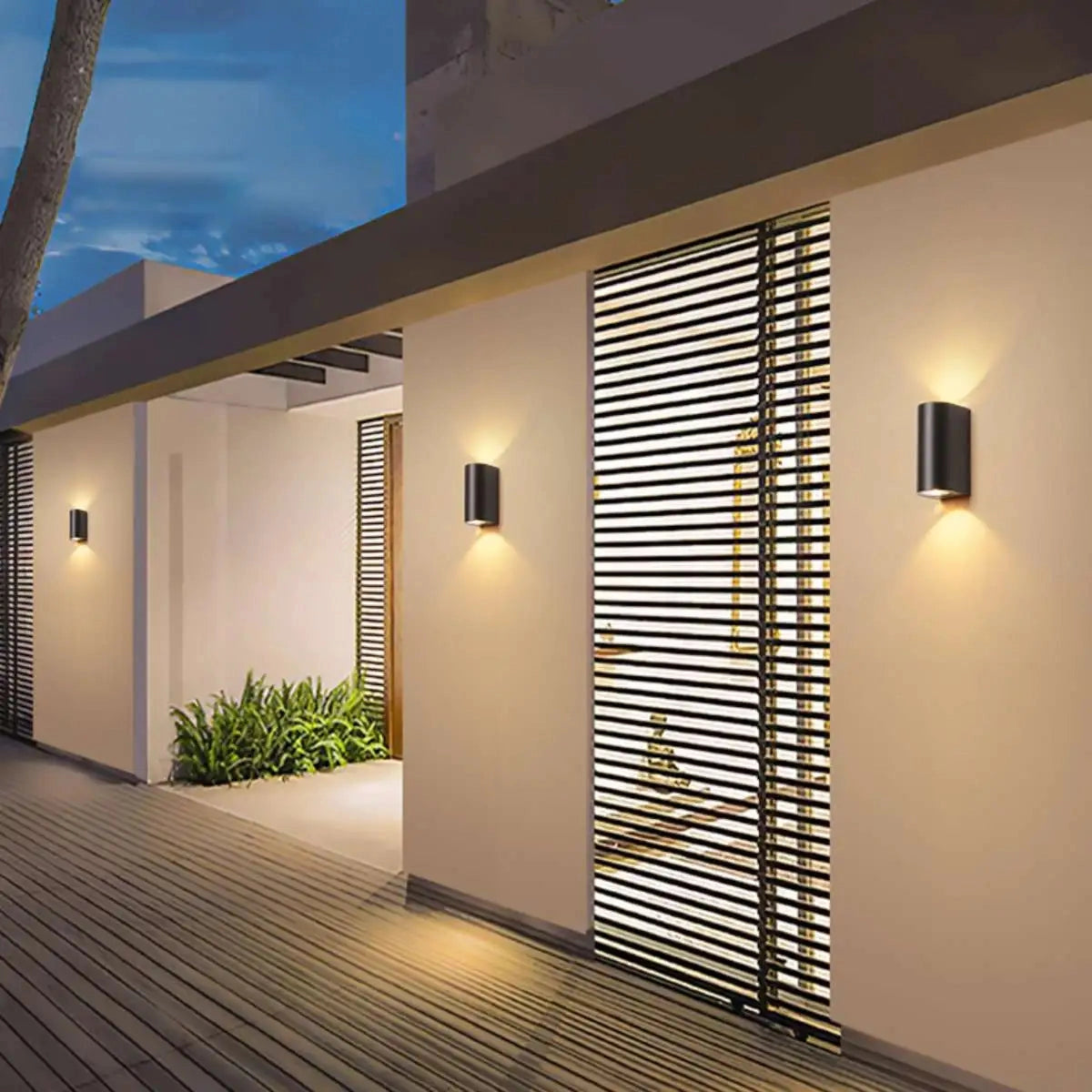 Modern Black LED Cylindrical Outdoor Wall Lamp mounted on a wooden exterior wall, illuminating the surrounding area.