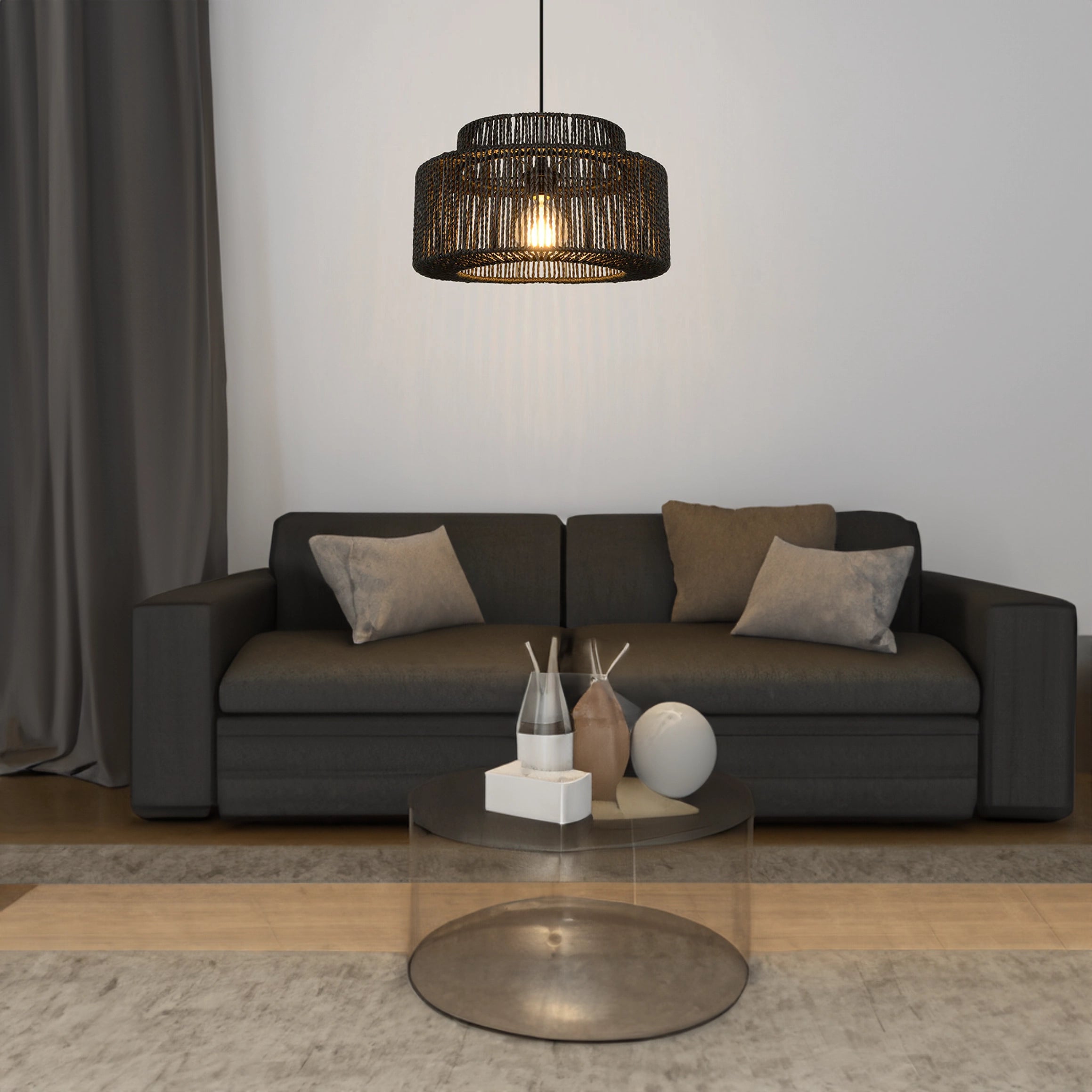 Black Rattan Woven Pendant Light hanging above a contemporary living room with a brown couch and wooden table.