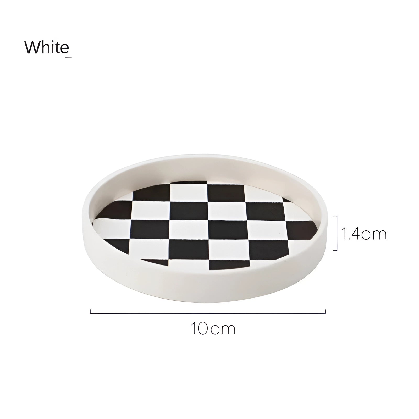 Black and white checkered ceramic trinket dish, 10cm in diameter, used for holding jewelry.