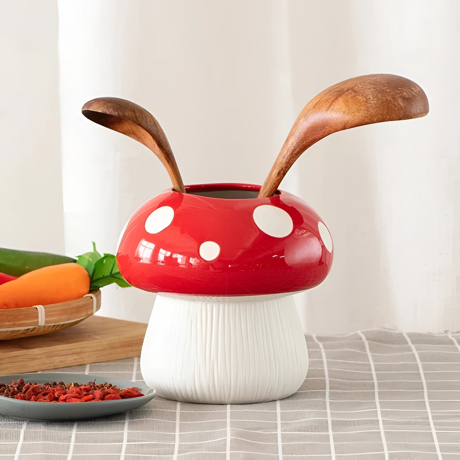 A black and white polka dot ceramic mushroom table lamp designed for whimsical home decor, featuring a unique mushroom shape with contrasting polka dot patterns.