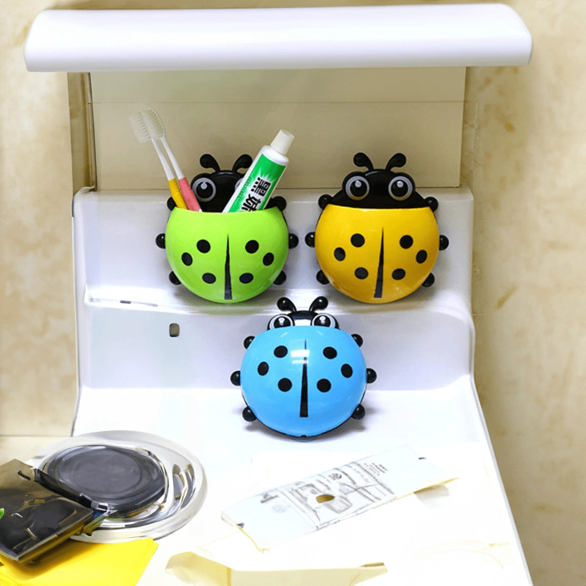 
A blue ladybug toy with white polka dots, designed as a cute and playful gift for kids, featuring detailed insect-like design and made from plastic.