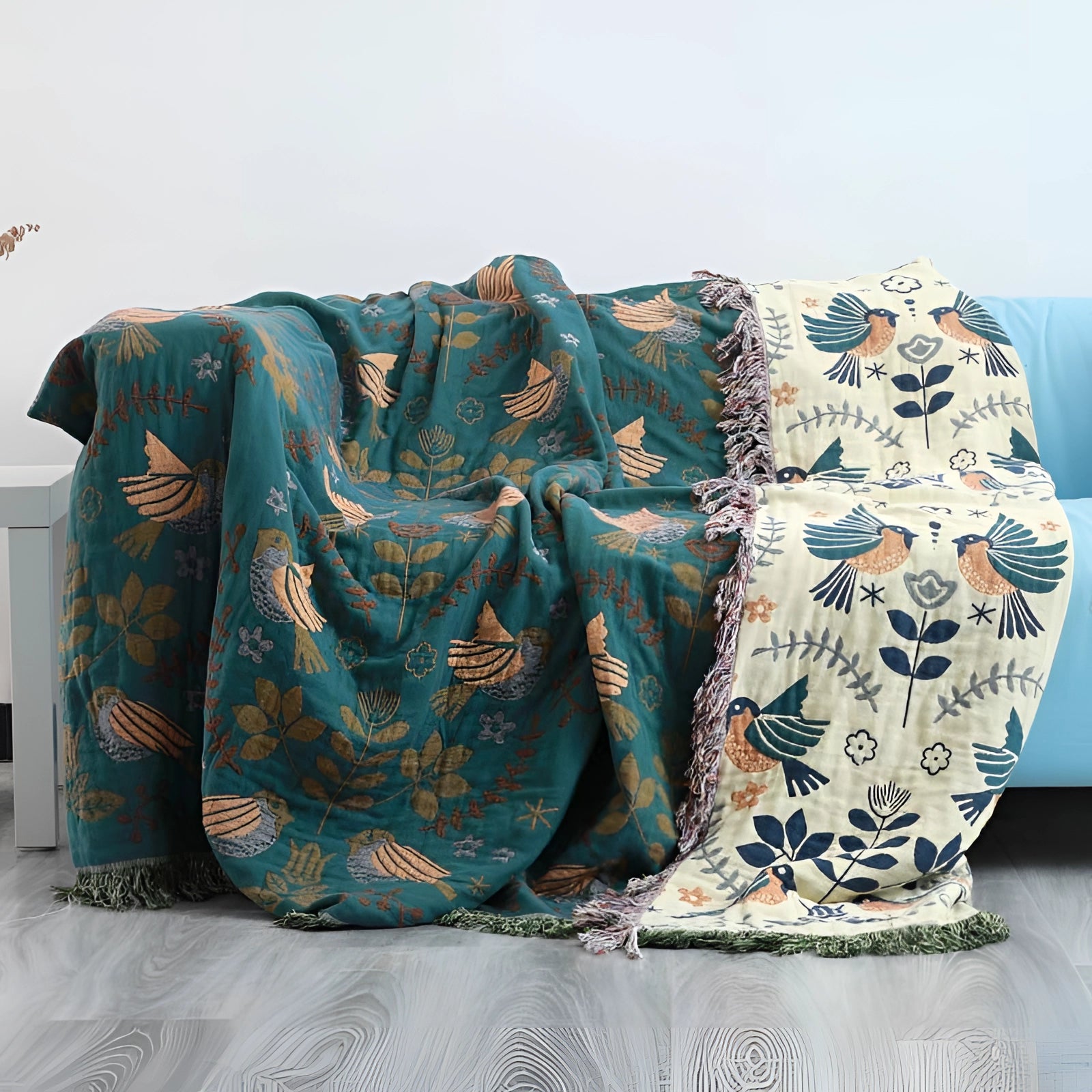 Bohemian Bird Pattern Throw Blanket in blue and beige featuring a fringed design, with an artistic motif and rectangular shape.