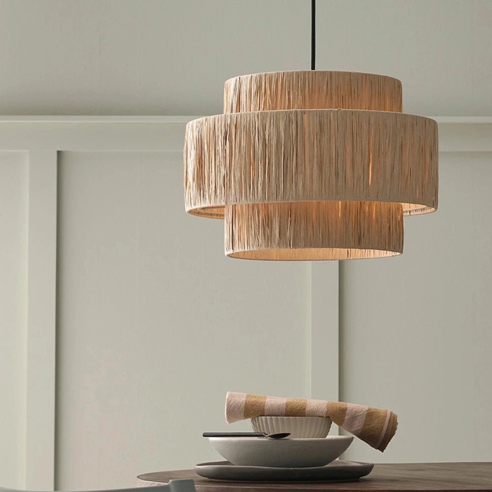 Bohemian Natural Fiber Pendant Light with Eco-Friendly Raffia Lampshade, 60cm diameter, hanging from a ceiling in a room with wooden shelving and decor.