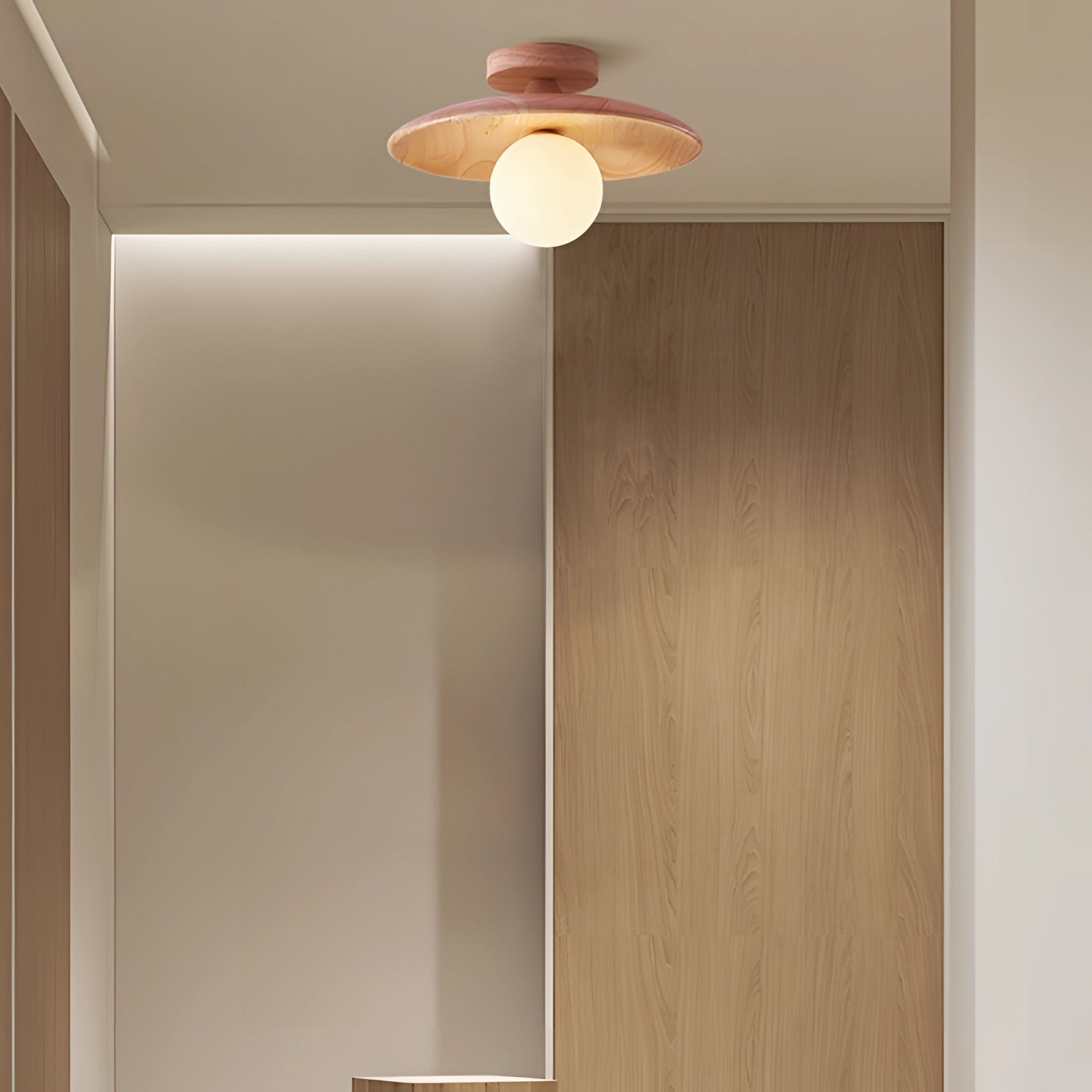 Bronze modern round flush mount ceiling light with a warm glow, featuring a 7-inch wood finish, mounted on a ceiling.