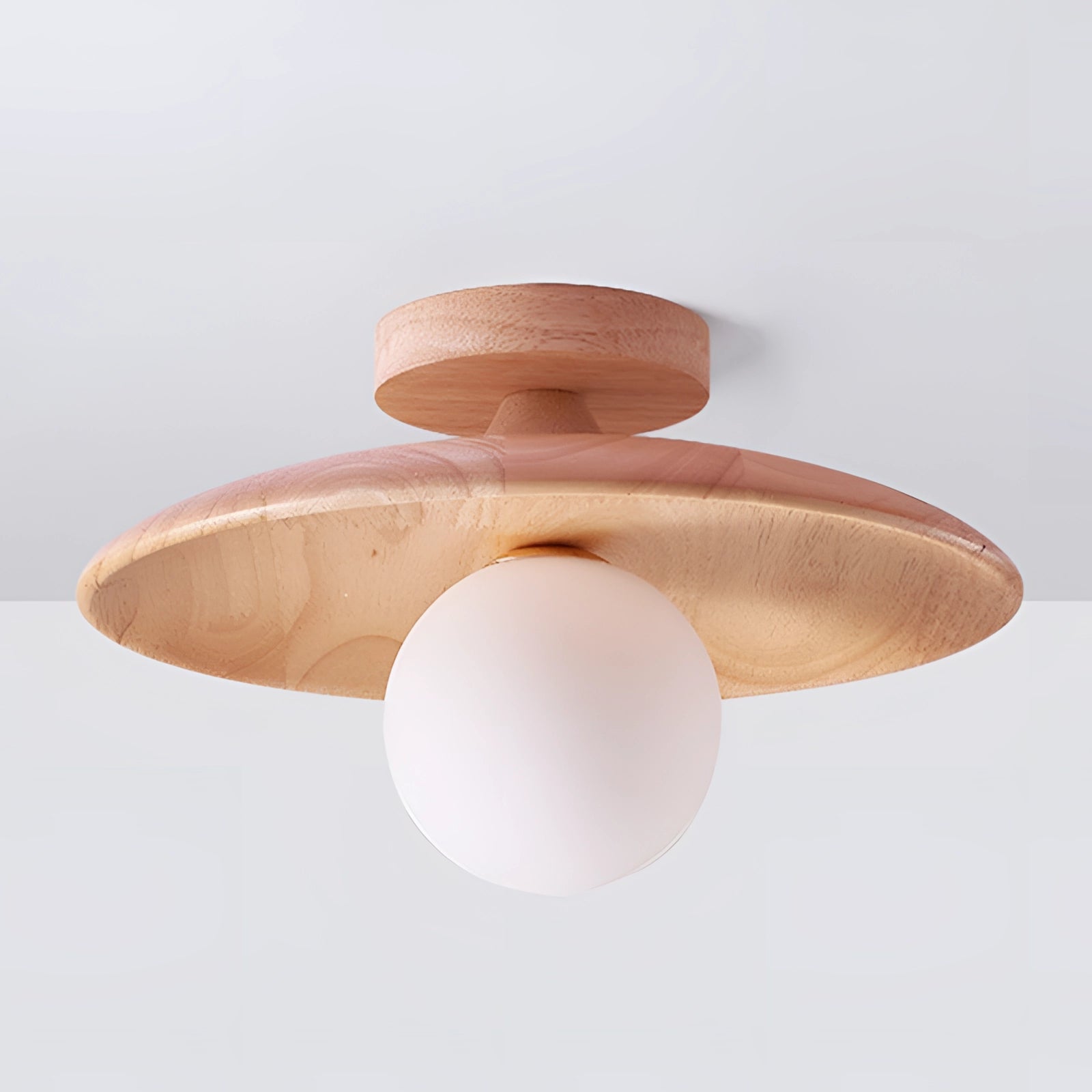 Bronze modern round flush mount ceiling light with a warm glow, featuring a sleek circular design and a minimalistic lampshade, suitable for contemporary interiors.