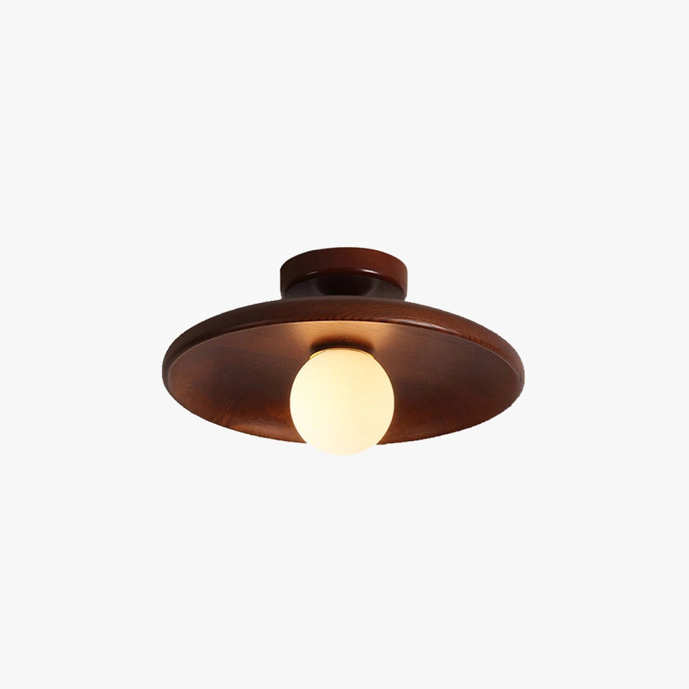 Bronze modern round flush mount ceiling light fixture with a warm glow, featuring a circular design made of metal and wood elements.