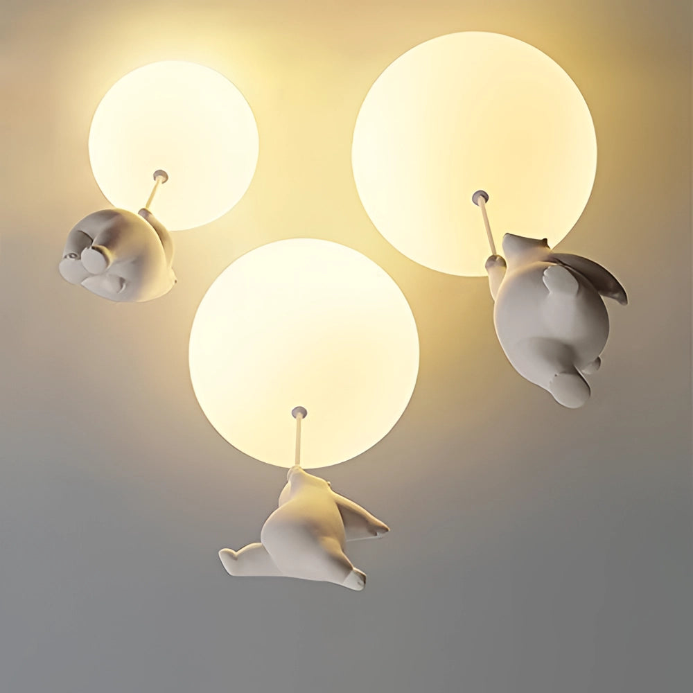 Modern cat-themed pendant light hanging from the ceiling, featuring a circular design with subtle art elements and shades, serving as an eye-catching ceiling fixture.