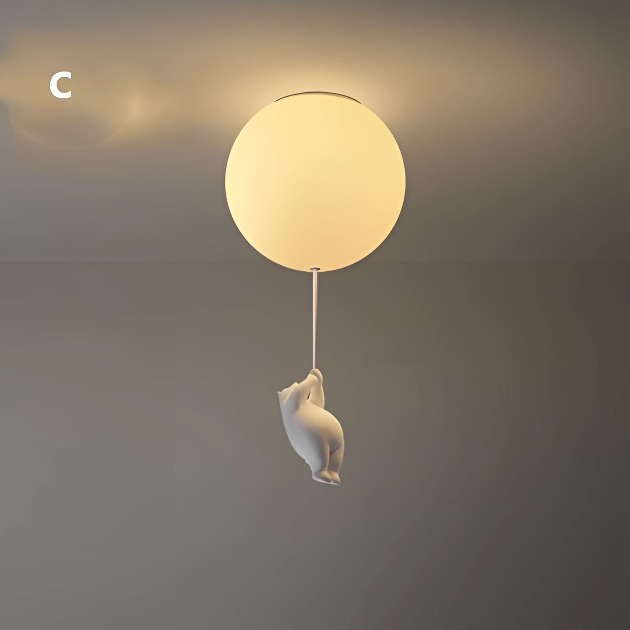 Large modern cat-themed pendant light fixture with a circular design, hanging from the ceiling against a backdrop resembling the sky, showcasing artistic elements and a soft, ambient glow.