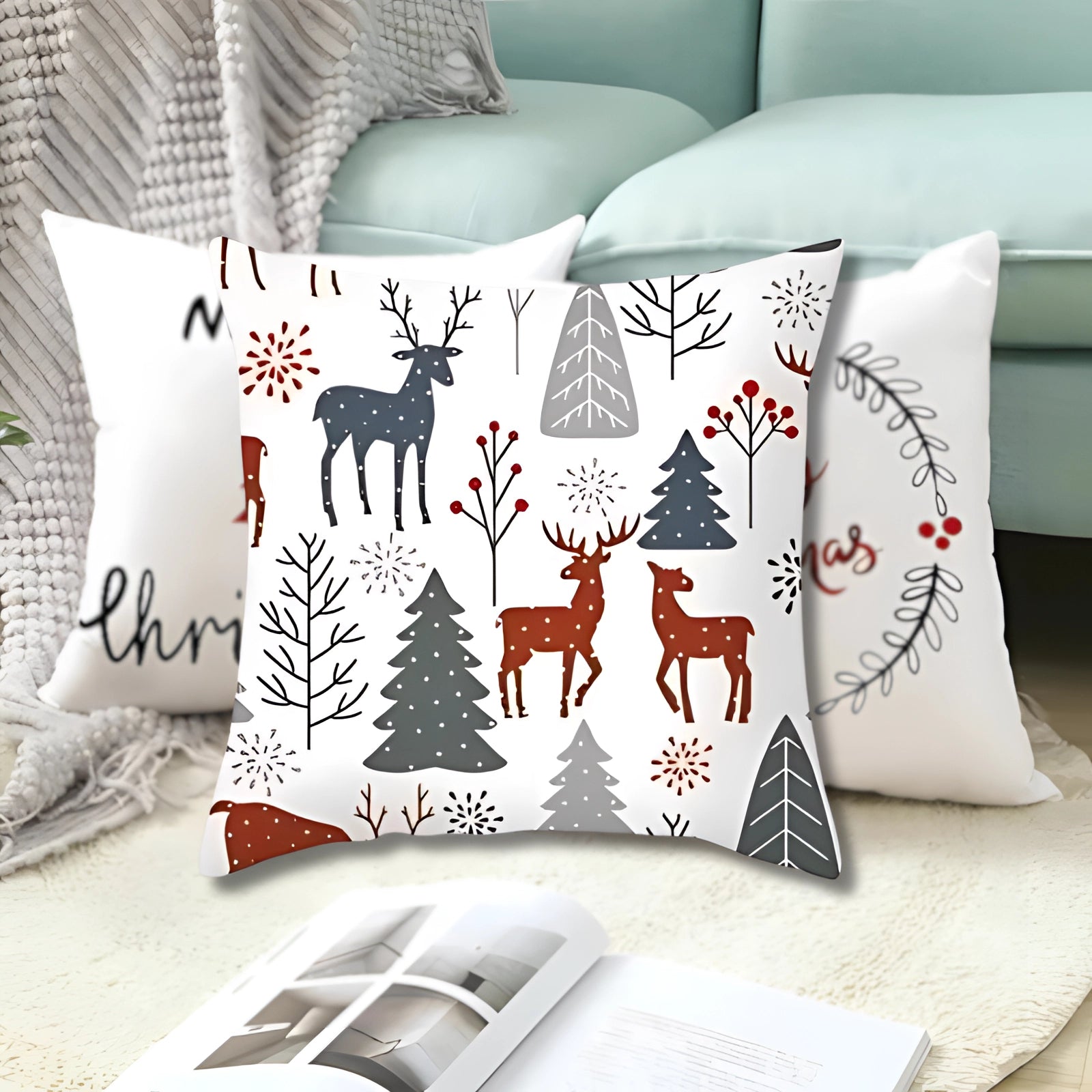 White rectangular Christmas cushion cover featuring a black reindeer and snowflake design, displayed on a couch as part of holiday interior decor.