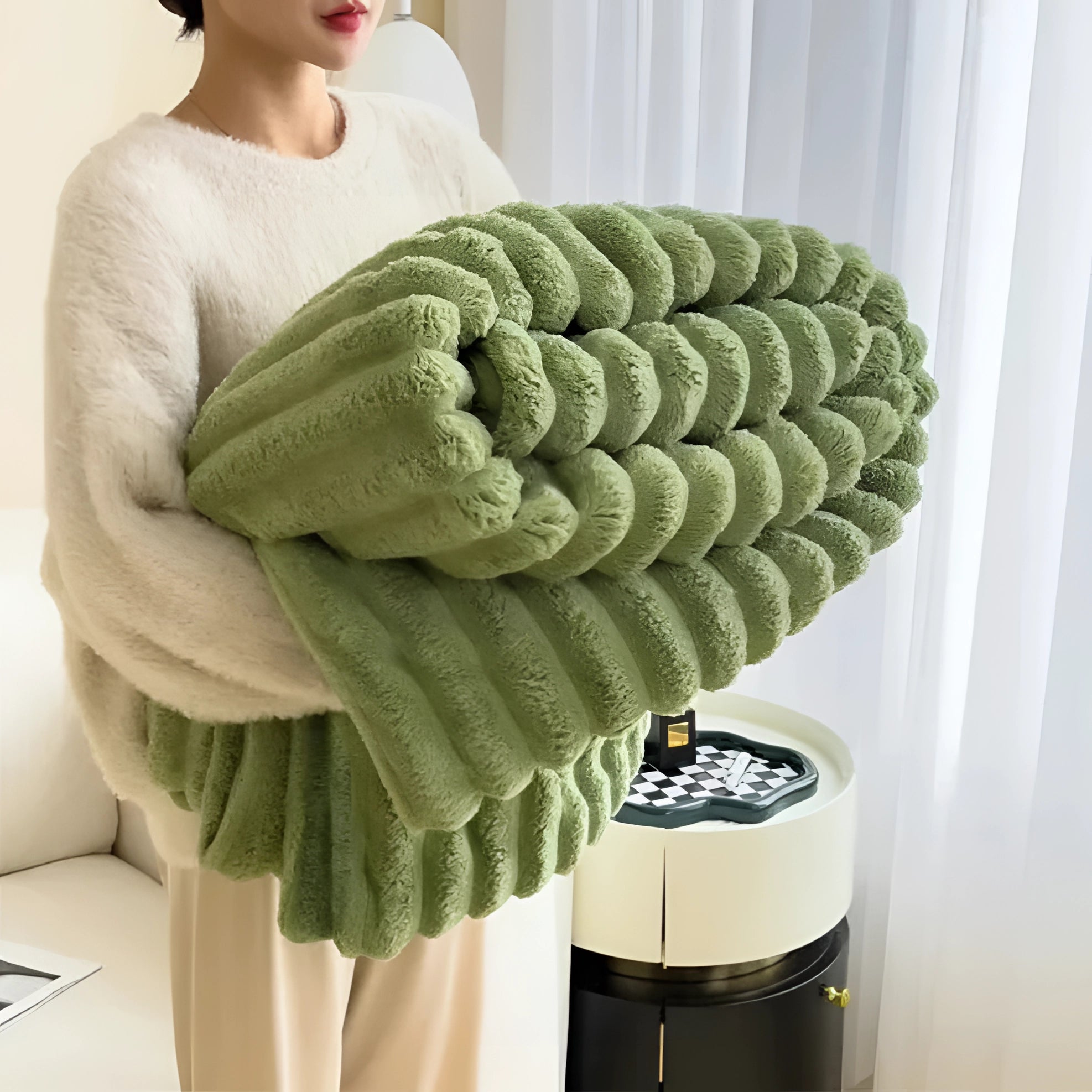 Chunky knit blanket in matcha green, measuring 200x230cm, showcasing a cozy and textured design, perfect for adding comfort and style to a sofa or bed.