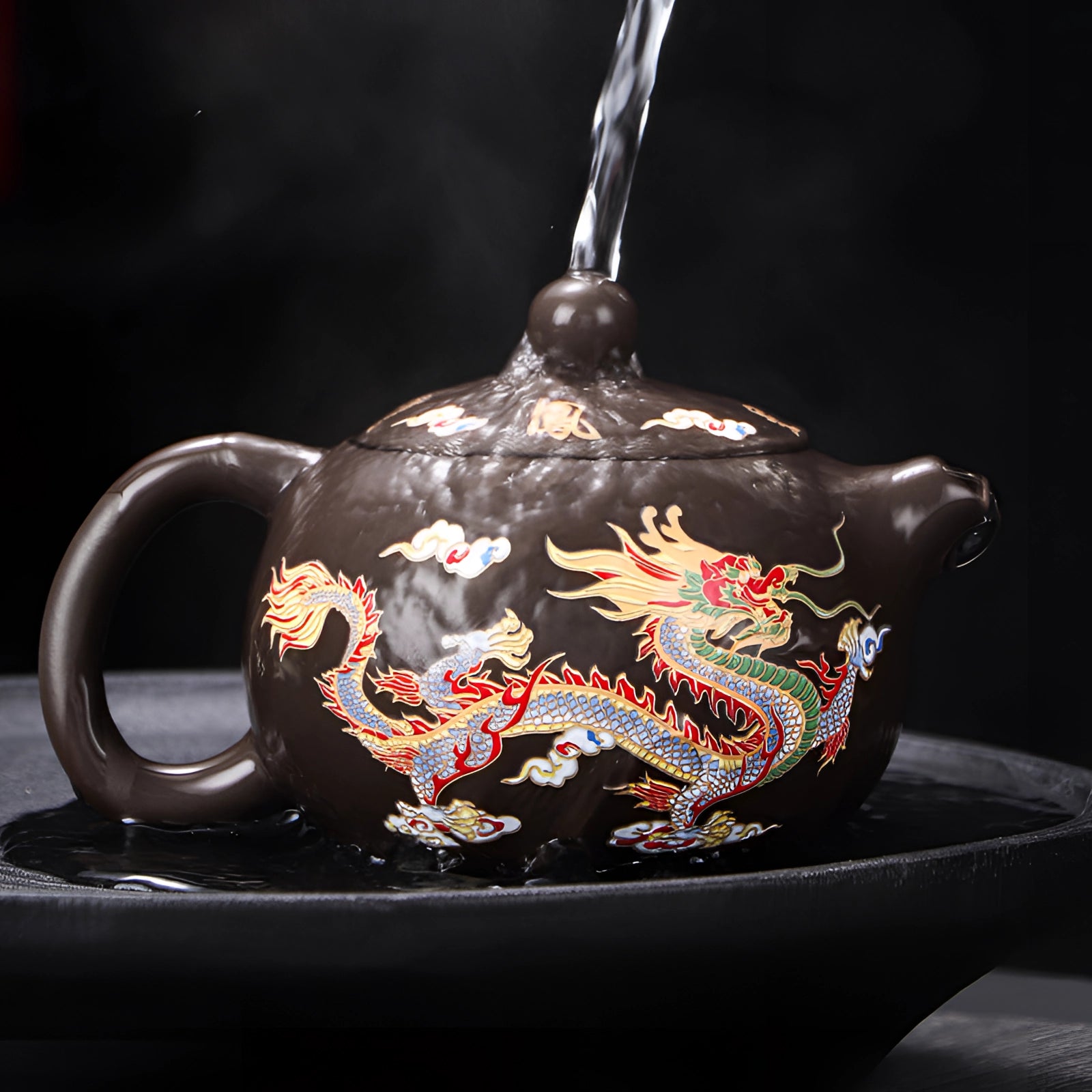 Hand-painted Chinese ceramic teapot with dragon design, featuring a heat-resistant build, suitable for serving tea.