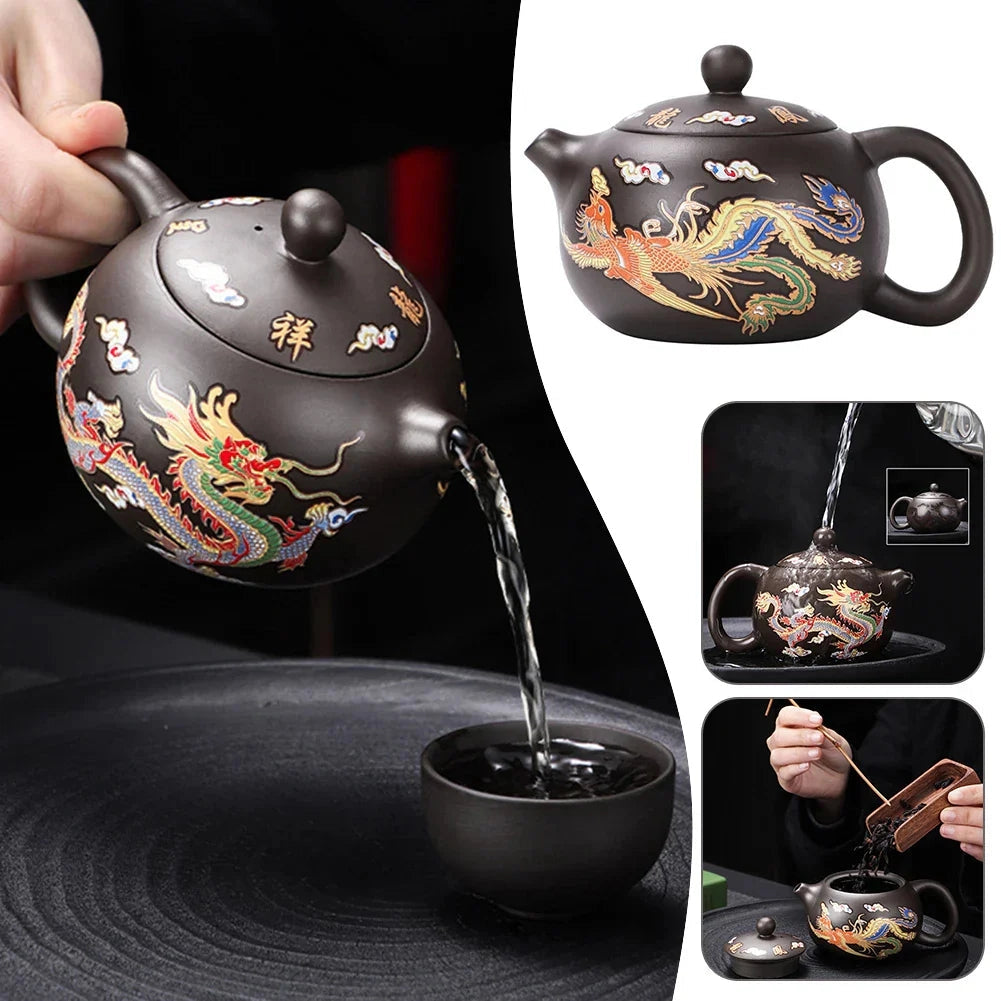 Hand-painted Chinese ceramic teapot with dragon design, featuring heat-resistant properties.