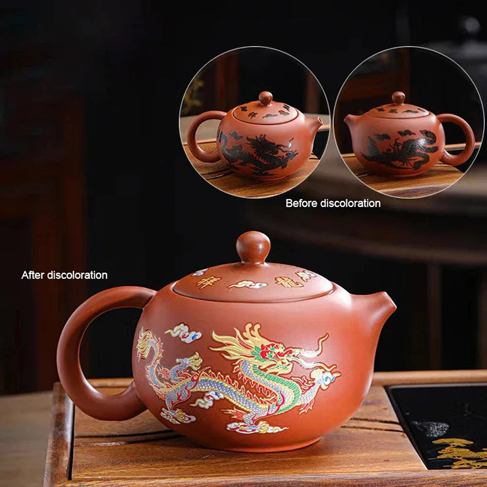 Hand-painted Chinese ceramic teapot with a dragon design, featuring a red color scheme, suitable for serving hot beverages.