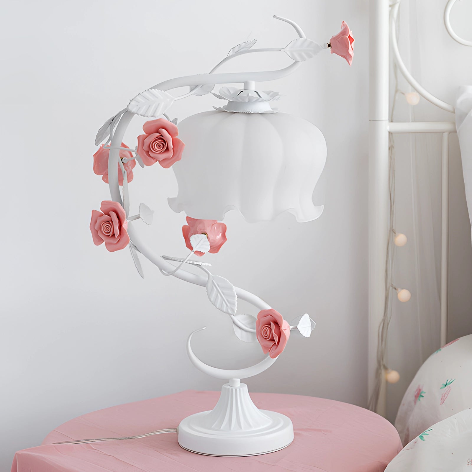 Elegant Pink Rose Table Lamp with Shabby Chic Floral Vine Design on White Base, displayed on a table with artificial flowers.