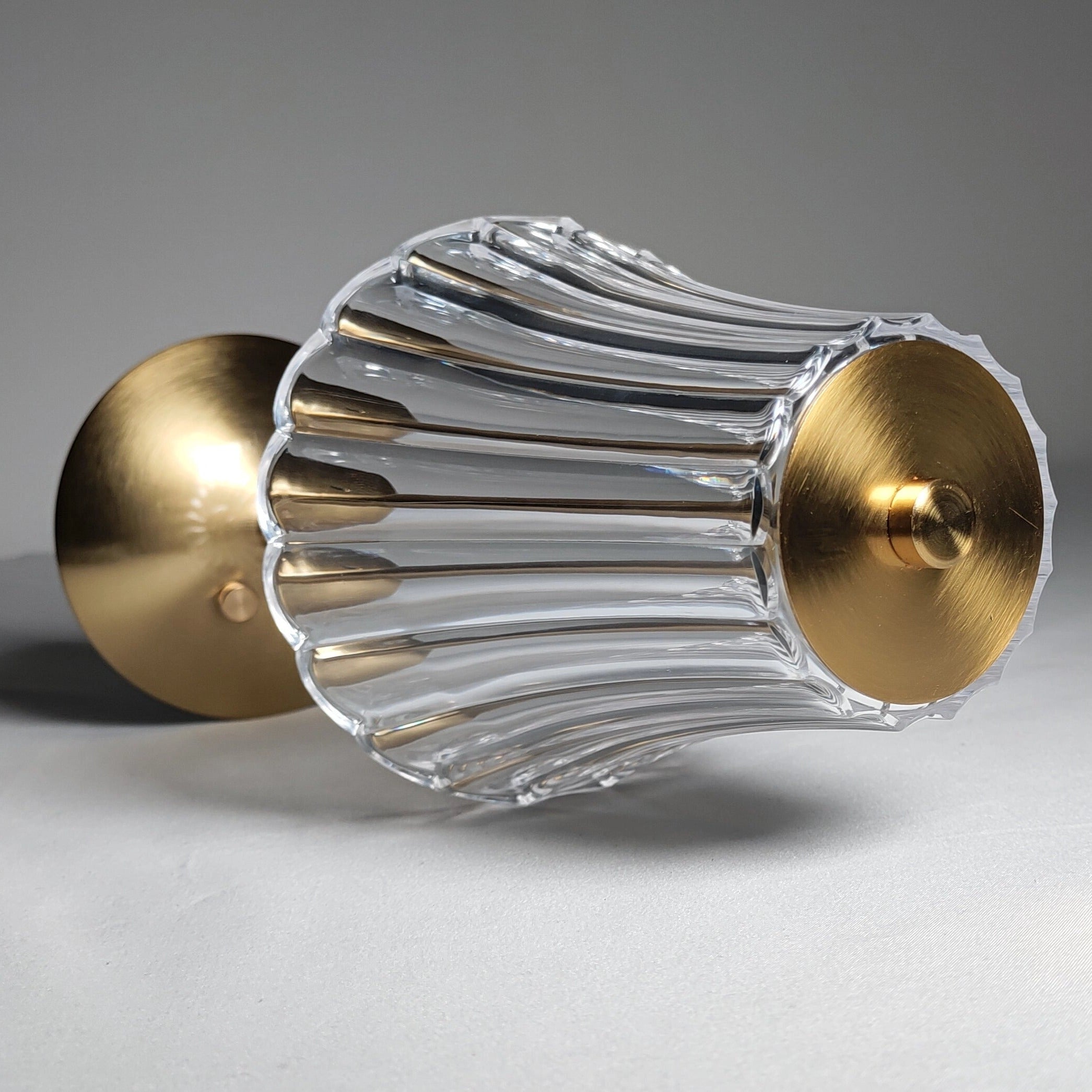 Elegant pleated table lamp with acrylic lampshade, modern gold base, and LED light.