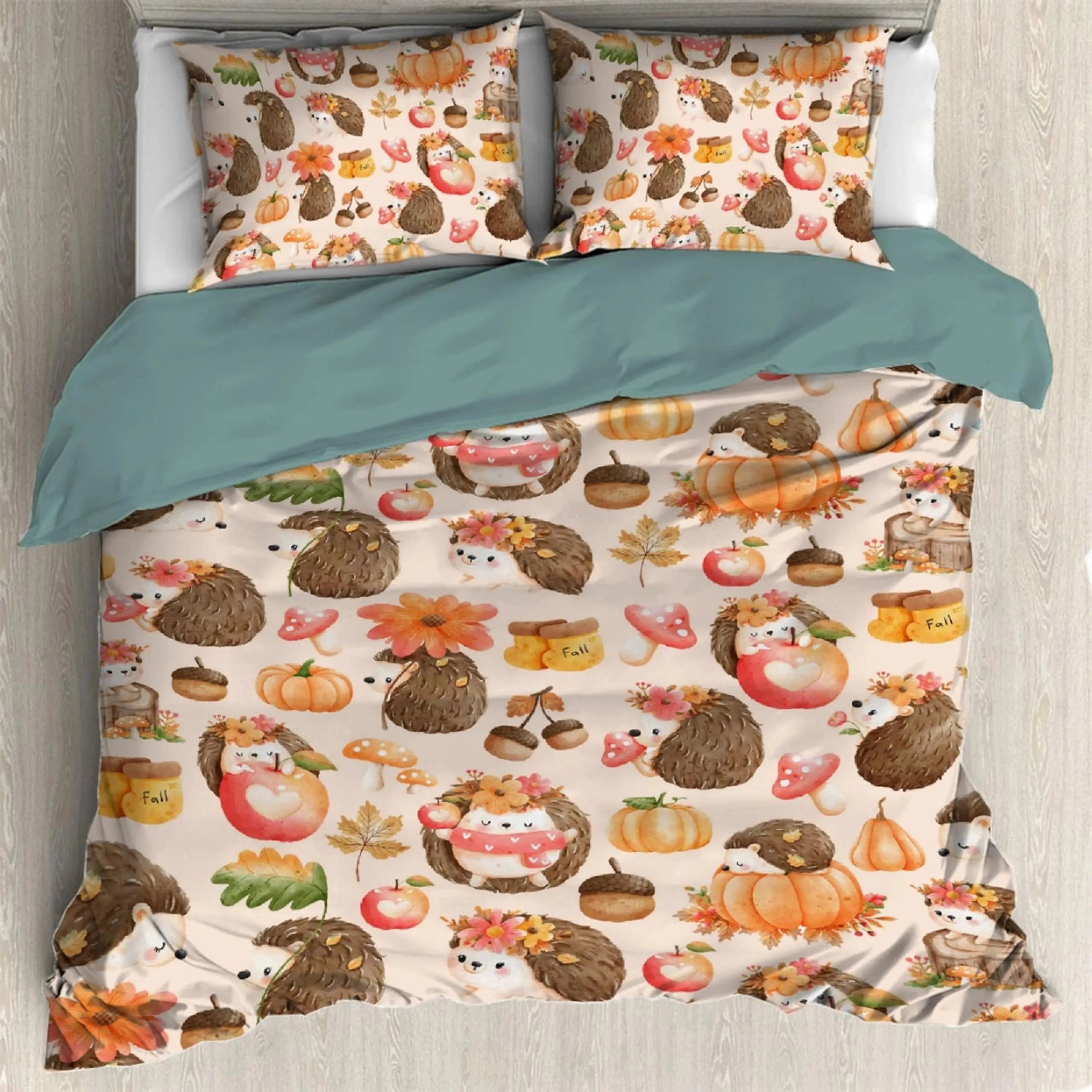 Fall-themed duvet cover featuring an autumn leaf pattern with pumpkins and orange leaves, displayed on a bed in a home interior setting.